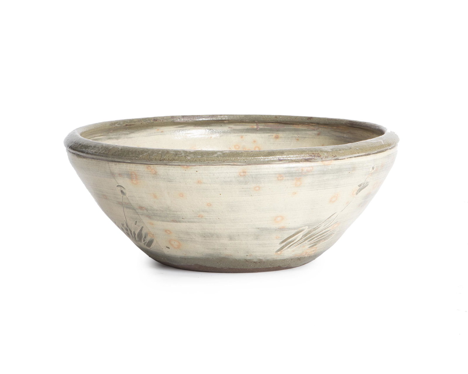 A large Korean ceramic bowl: Fourth quarter 20th century Signed for Lee Jung-do Wide-rimmed bowl with incised white-slip decoration 10.5" H x 27" Dia.