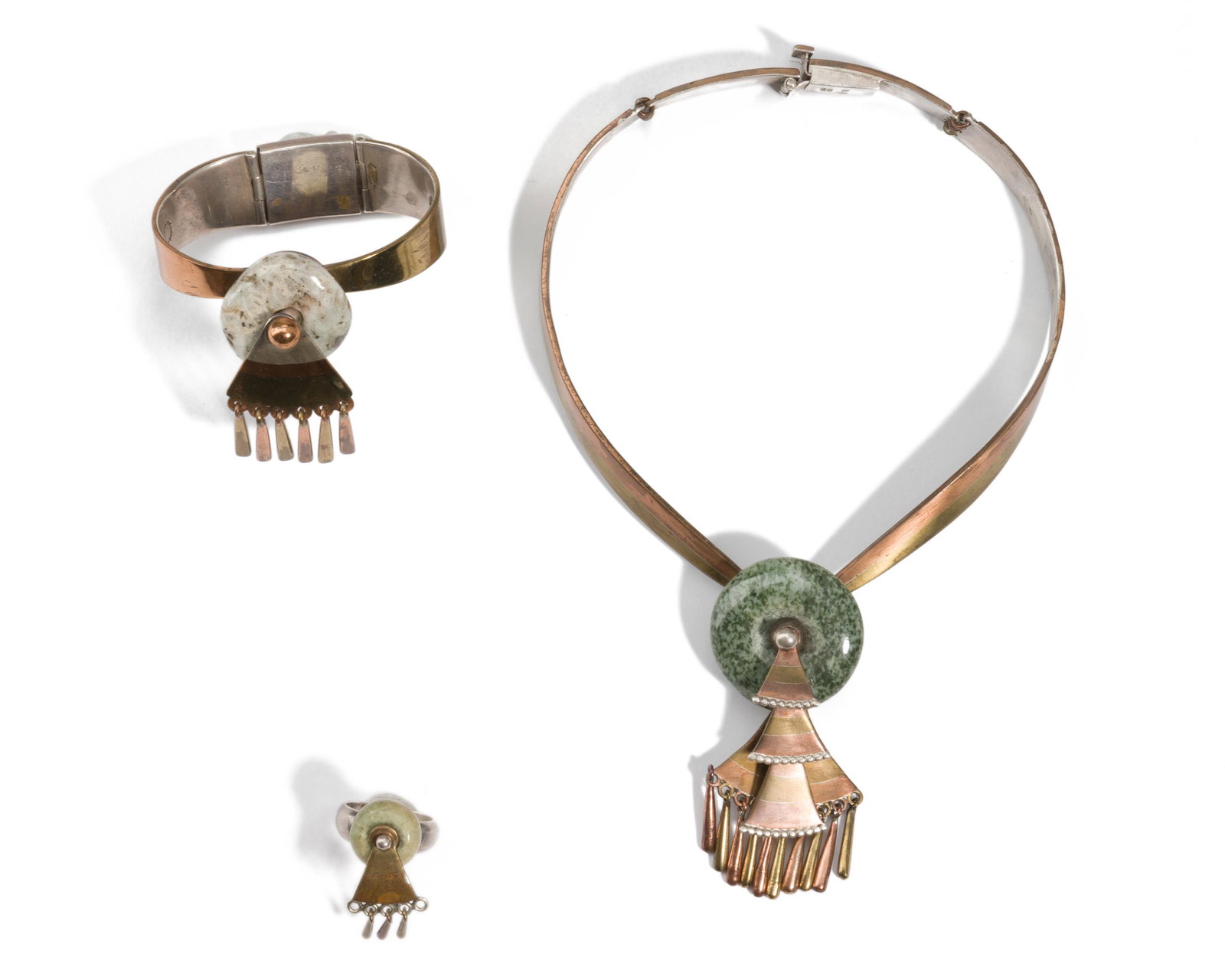 A suite of Los Castillo mixed-metal jewelry: Third quarter 20th century Stamped: Los Castillo / Mexico / Metales / Castillo; Two further stamped: 925 Comprising a necklace, a bracelet, and a ring, each set with a green stone ring suspending mixe