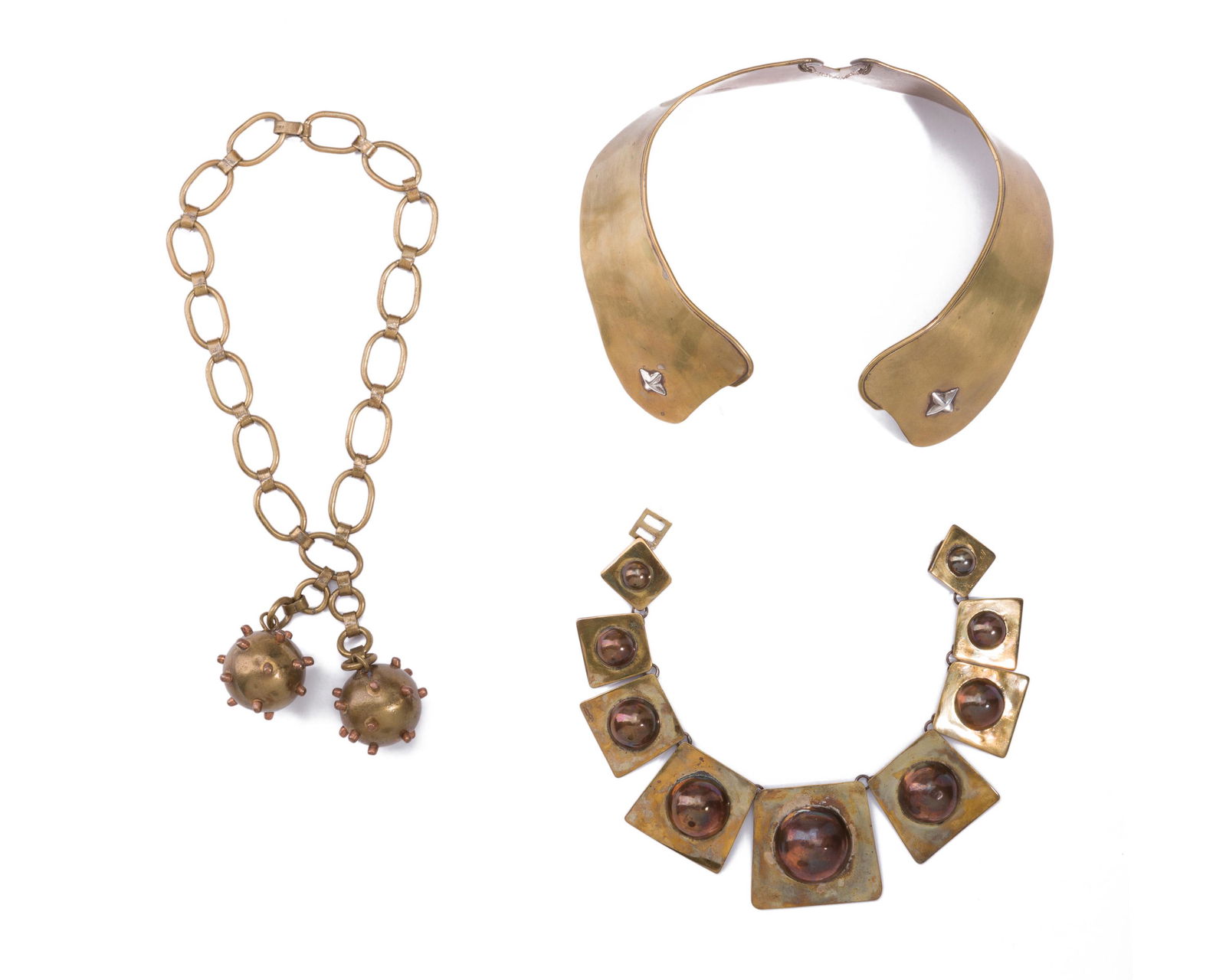 Three Hubert Harmon mixed-metal necklaces: Circa 1940s Each stamped: Hubert Harmon Mexico Comprising a copper and brass graduated shield necklace with black velvet lanyard, a brass sputnik necklace, and a brass and silver collar, 3 pieces L