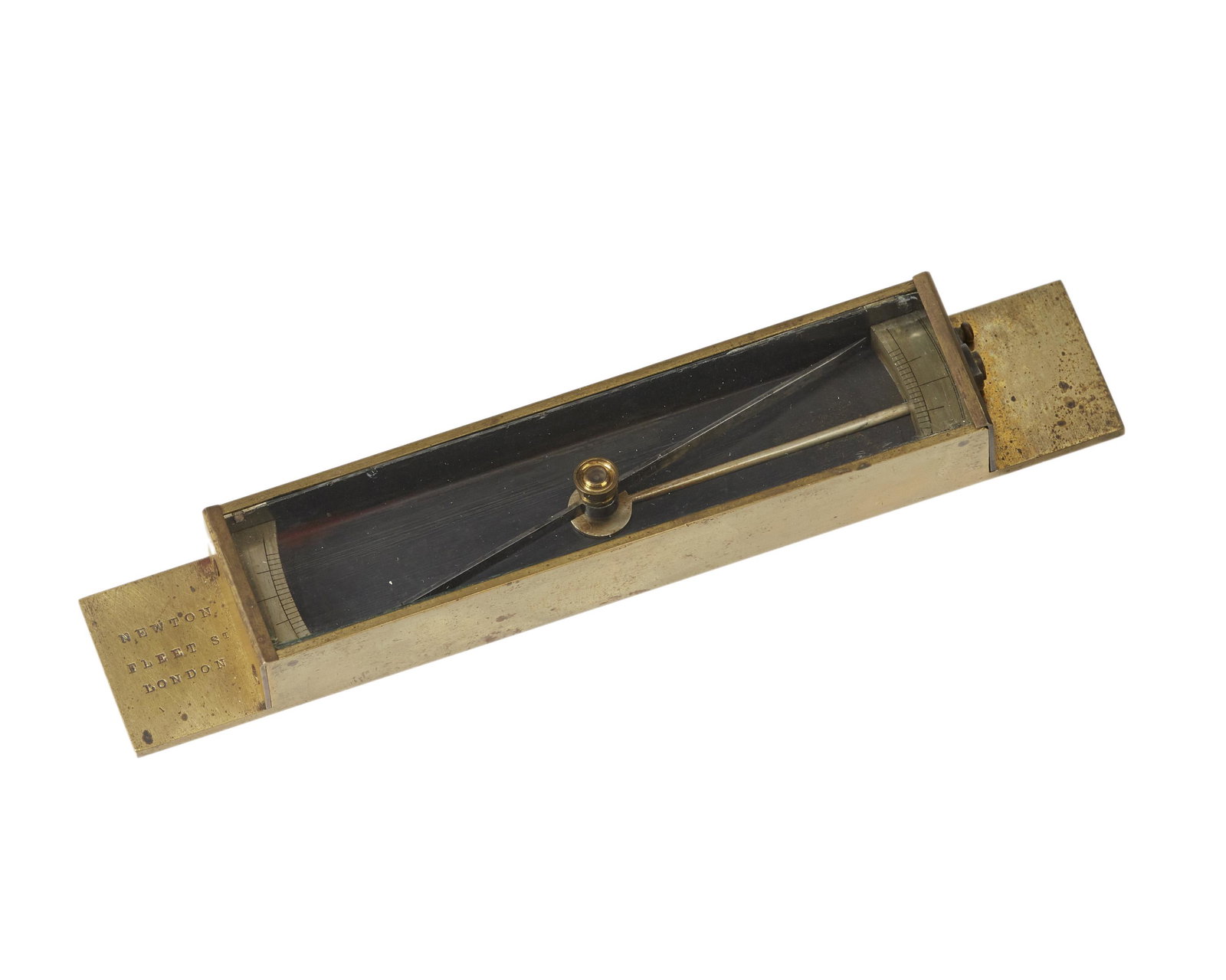 A Newton brass-mounted trough compass: Third quarter 19th century Signed: Newton / Fleet Street / London Brass, steel, and glass construction 6" H x 1" W x .75" D Provenance: Purchased: Tesseract, Hastings-on-Hudson, NY. Property from the 