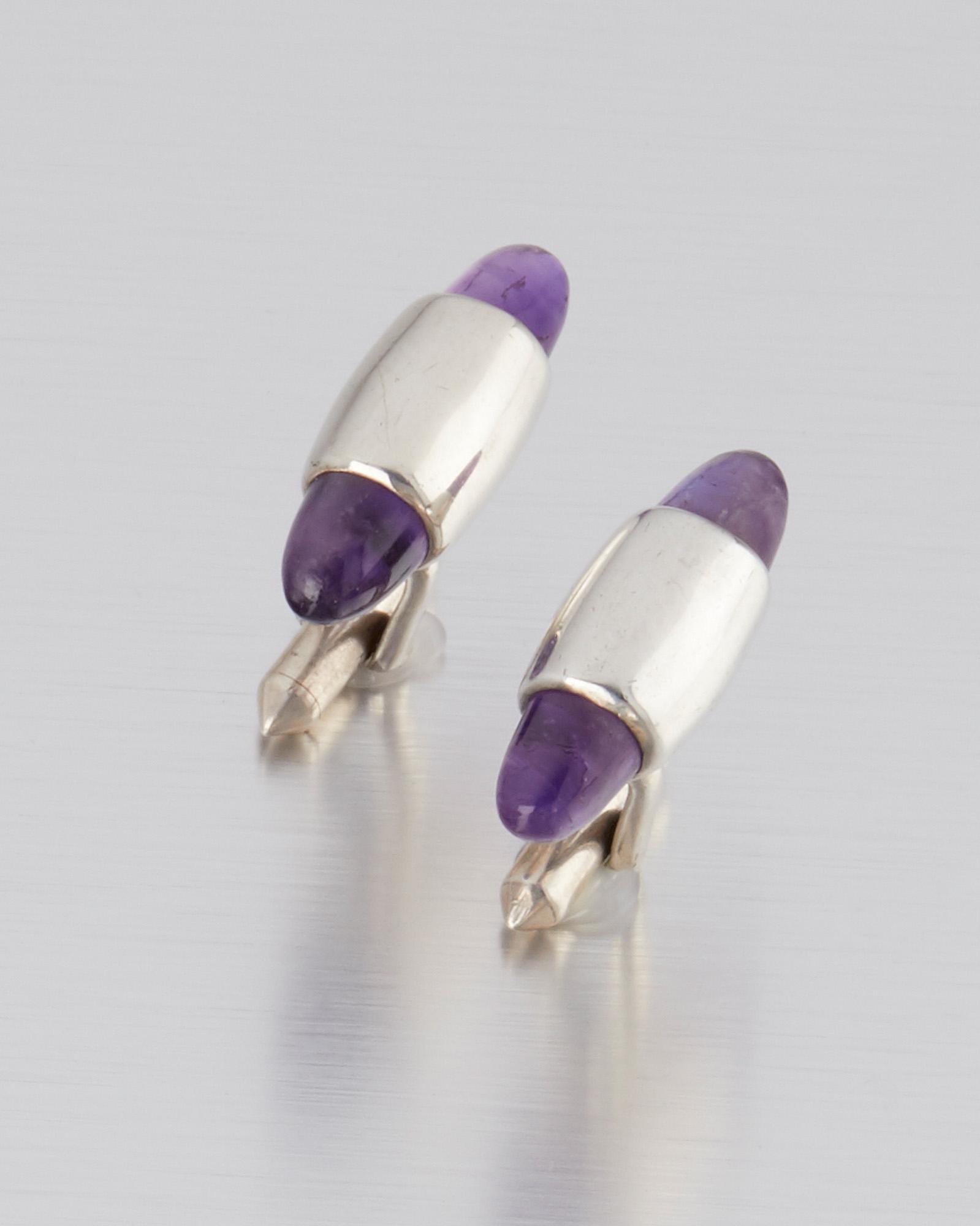 A pair of Antonio Pineda silver and amethyst cufflinks: 1953-1979; Taxco, Mexico Crown mark for Antonio Pineda; Eagle 208 Each cufflink designed with cone-shaped amethysts, 2 pieces 1.5" H x 1.25" W 25.5 grams Provenance: The Collection of Cindy Tietze-Hod