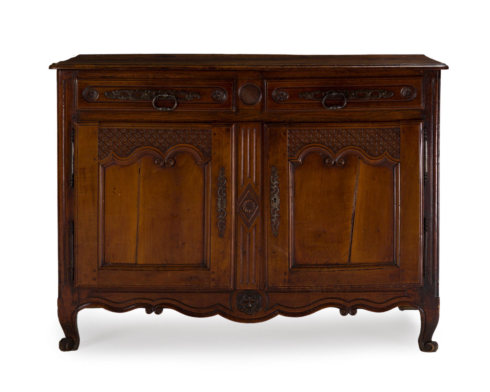 A French Provincial sideboard: 18th century The rectangular top with rounded corners over a carved wood carcass issuing two short drawers and a double door cabinet enclosing a single shelf raised on bracket feet 36.5" H x 42.125"