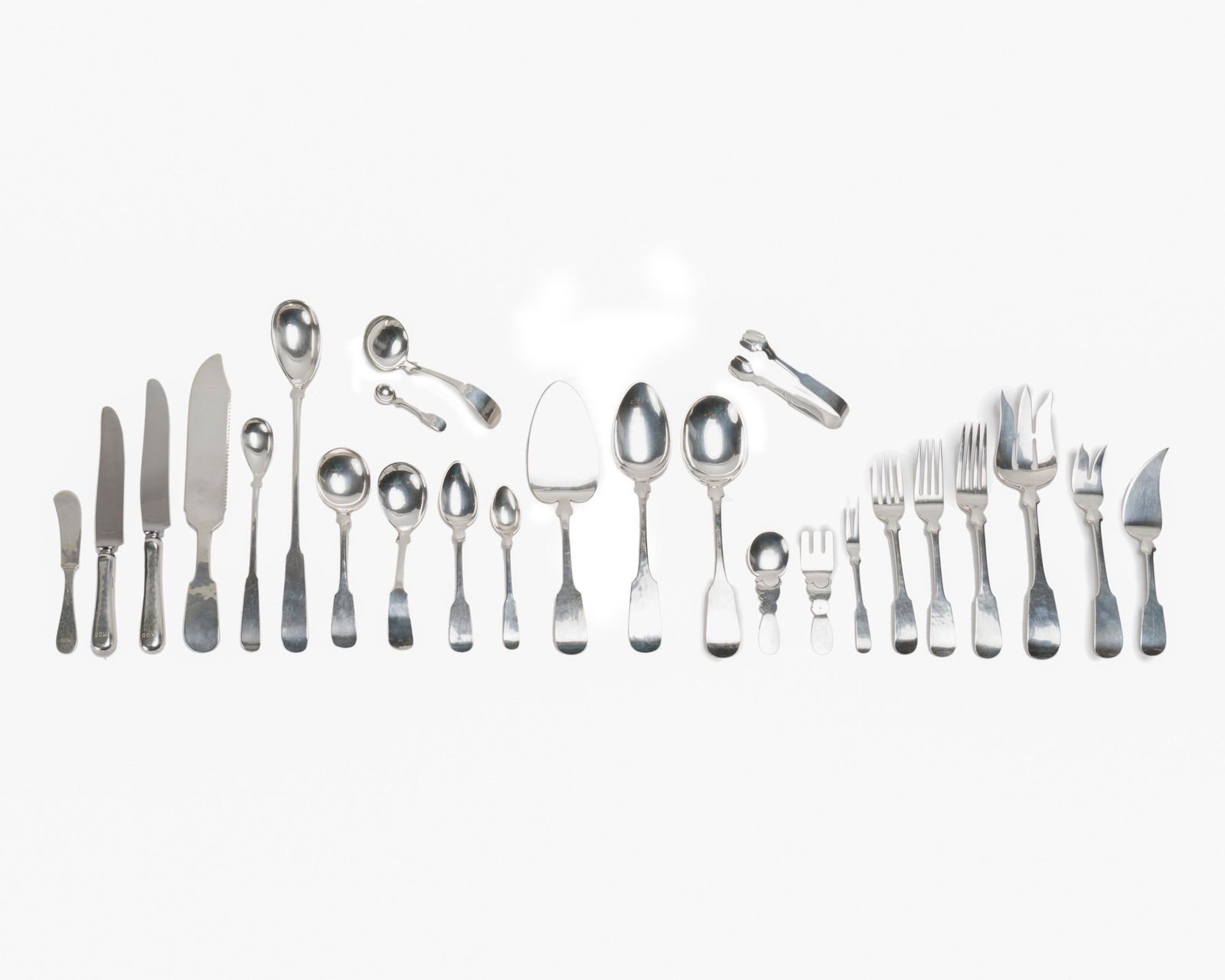 A Porter Blanchard "Fiddle" sterling silver flatware: First-quarter 20th century Each stamped for Porter Blanchard; Further stamped: Handmade / Sterling Comprising 8 dinner knives (9.375"), 8 luncheon knives (8.375"), 8 butter spreaders (5.5"), 8 dinne