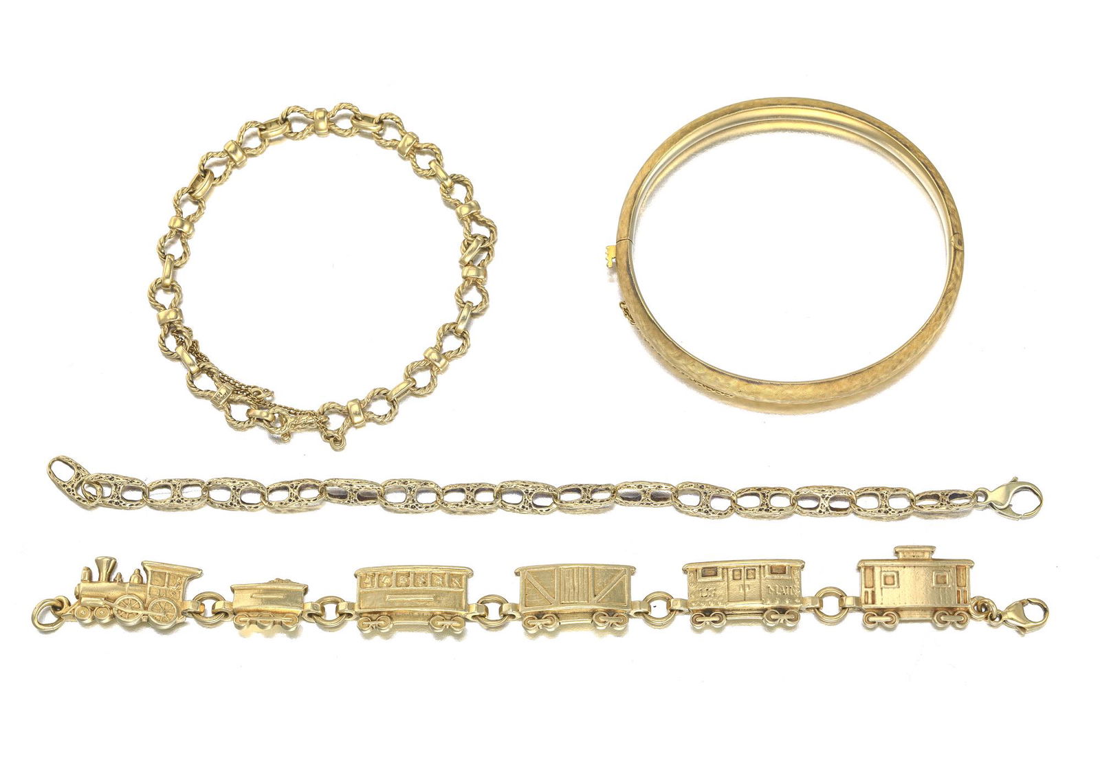 Four gold bracelets (1 of 1)
