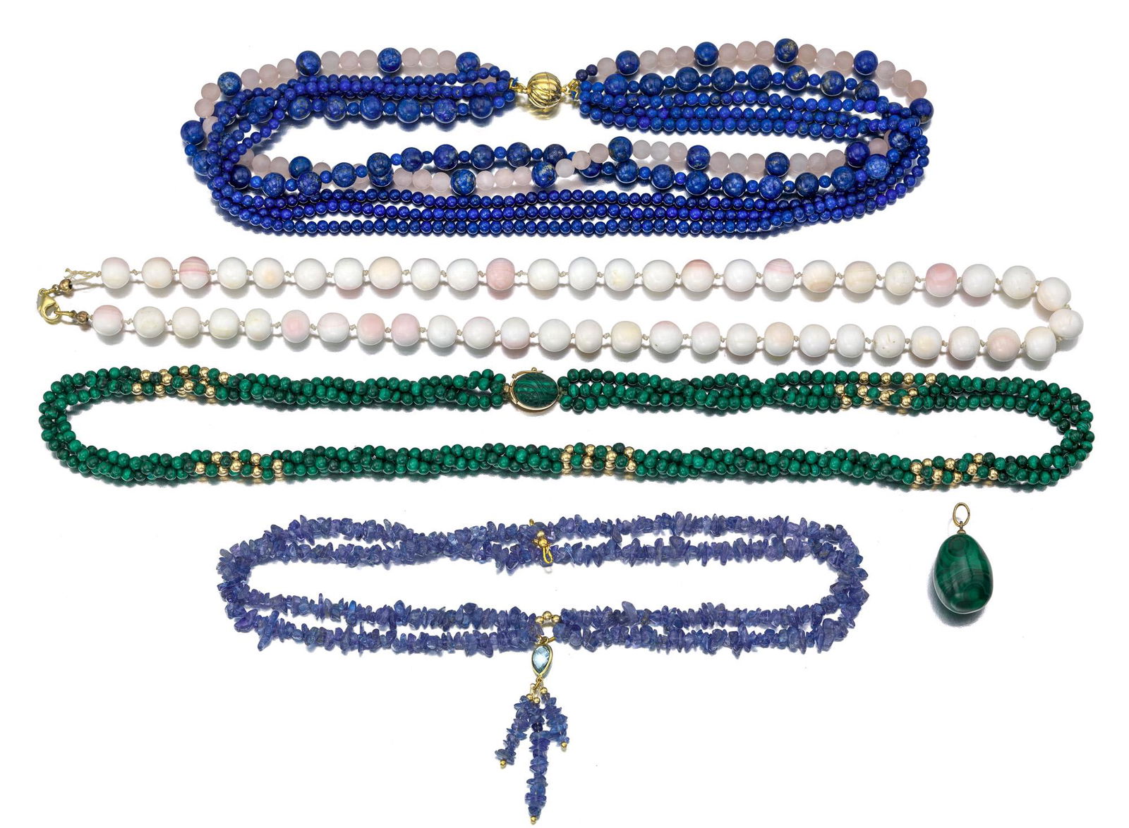 A group of bead jewelry: Comprising a malachite bead necklace with 14k yellow gold clasp; A coral bead necklace; an iolite bead necklace with 14k yellow gold clasp; A sodalite and quartz bead necklace with silver-plated magne