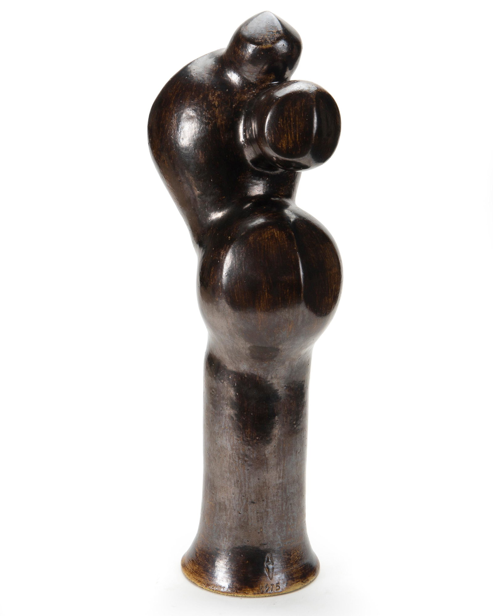Anthony Villis (20th Century, American): Abstract sculpture Glazed stoneware atop a wood pedestal Stamped with the artist's initials and dated to base: AV / 1975 Sculpture: 22.25" H x 11" W x 6.5" D; Pedestal: 55.25" H x 10.25" Dia.