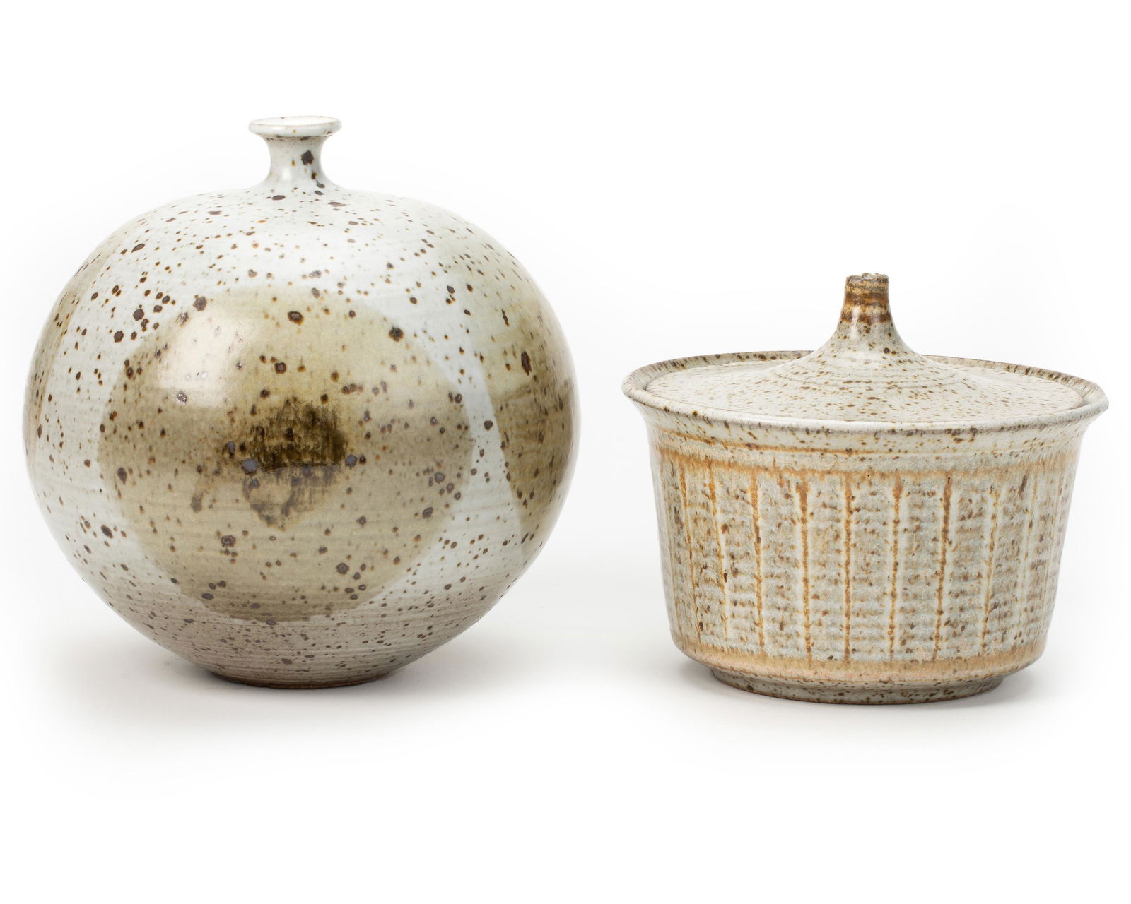 A studio pottery weed pot and Robert Maxwell covered: Second-half 20th century Weed pot signed indistinctly to base The white, brown and green weed pot with narrow neck together with a Robert Maxwell speckled covered round jar with columnar pattern La