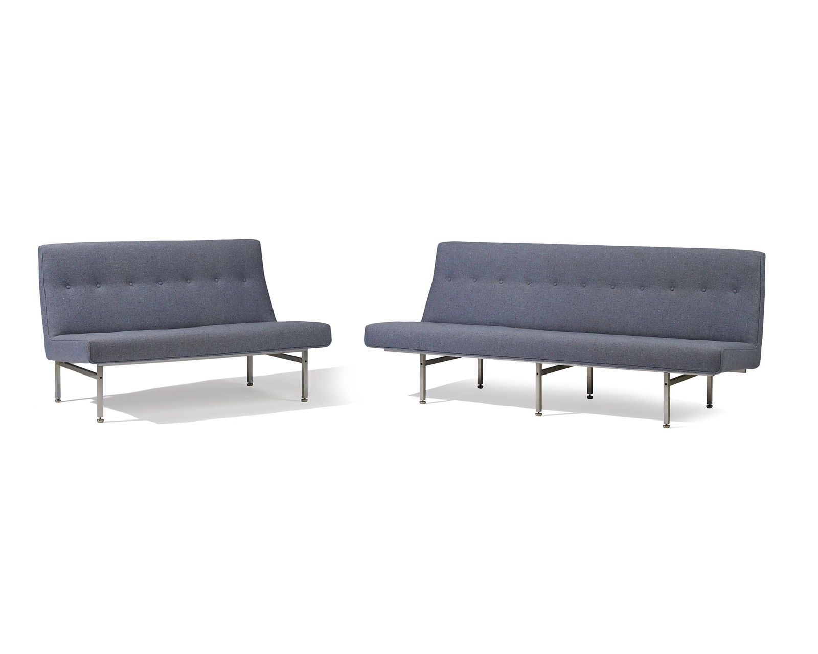 A pair of Kasparian blue modern armless settees: Second-half 20th Century Model No. KM/24-48 and KM/24-72 Each reupholstered in light blue hopsack fabric with button tufted seats with a thin rectangular metal frame, 2 pieces Larger: 31" H x 74" W