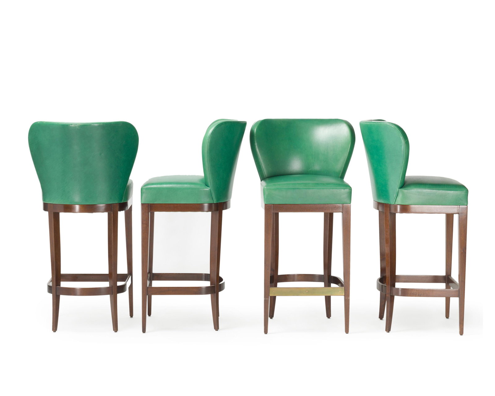 A set of four contemporary bar stools: Third quarter 20th Century Each in green leather on wood bases, 4 pieces Each: 44" H x 23" W x 21.75" D