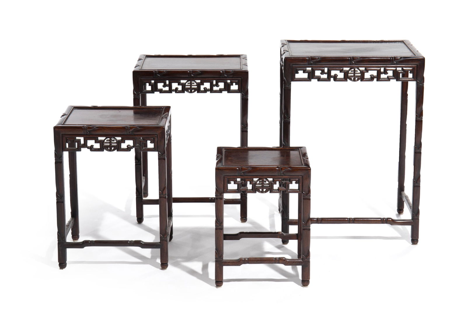 A set of four Chinese nesting tables (1 of 3)