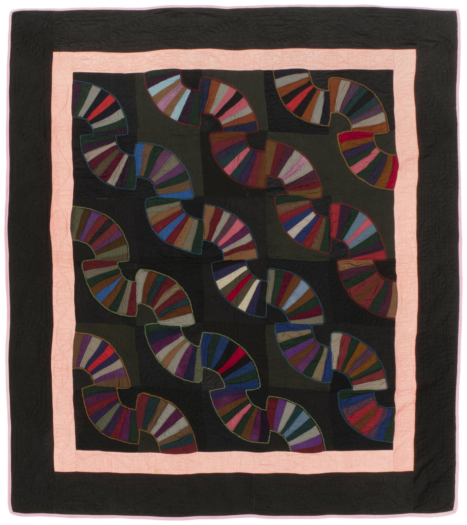 An Amish Fans quilt: 1934, Shipshewana, Indiana Made by Lydia S. Whetstone, quilted: 1934 to one corner Wool and cotton sateen in multicolored fans with hand embroidered edging on a black field and pink inner border and b