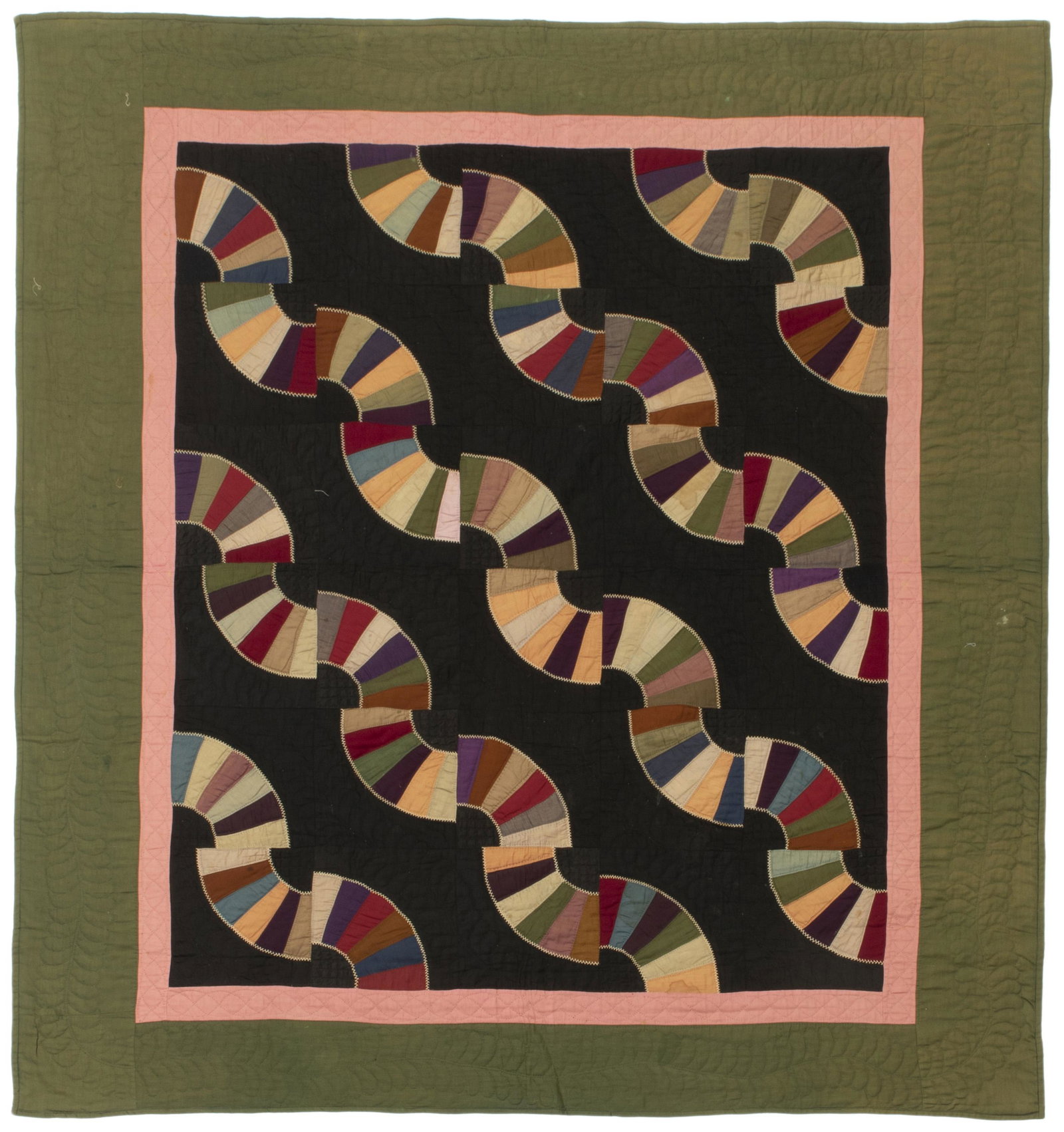 An Amish Fans in a Drunkard's Path quilt: Circa 1915, Pennsylvania Wool, cotton, and cotton sateen multicolored fan motif on black field with pink inner border and green outer border, hand quilted in feathers and interlocking ovals with embro