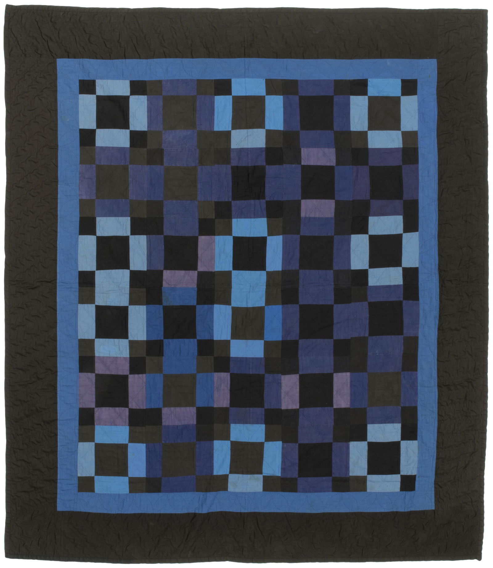 An Amish Nine Patch Variation quilt: 1920-1930, Ohio Cotton with blue, black, and purple blocks all within a blue inner border and larger black outer border, hand quilted in diamonds and oval leaves with a royal blue cotton backing 74"