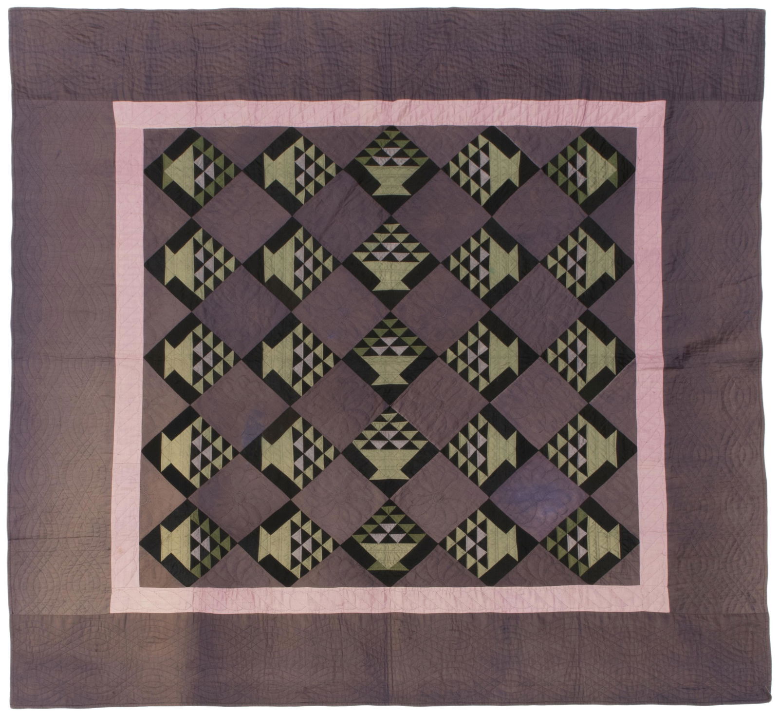 An Amish Basket quilt: 1929, Ohio Quilted to inner corners: L/ M/19/ 29 Cotton with green baskets in black diamonds on purple field with a lavender inner border, hand quilted in parallel lines, flowers, ropes, and double