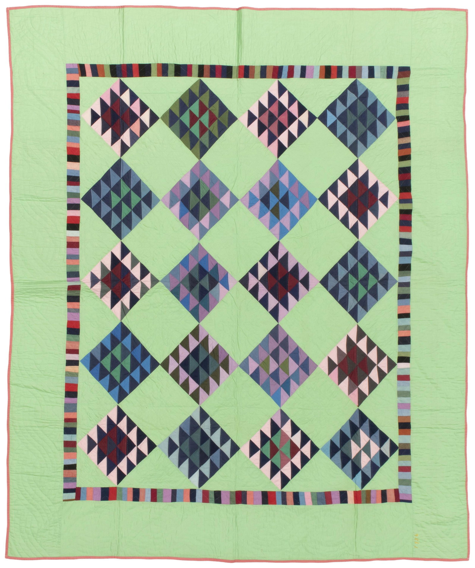 An Amish Lady of the Lake quilt: 1936, Holmes County, Ohio Cotton with multicolored blocks and a multicolored inner border all on a pale green field and pink binding edge, hand quilted in cables, chevrons, and tulips with a cream cot