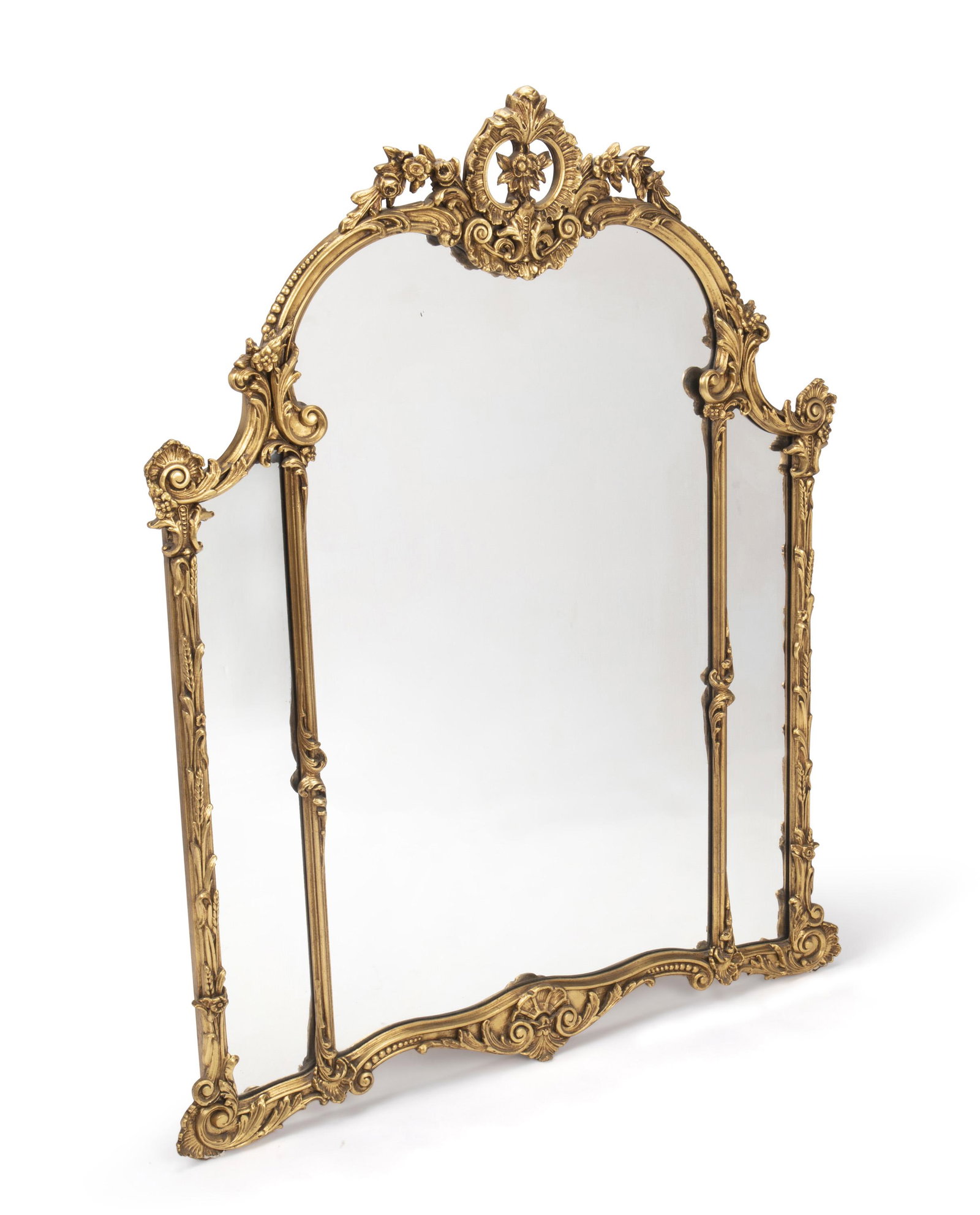 A carved wood, gesso, and gilt wall mirror: Mid-20th Century The three-paned mirror with scrolling gilt-foliate design 57" H x 44.5" W x 1.75" D