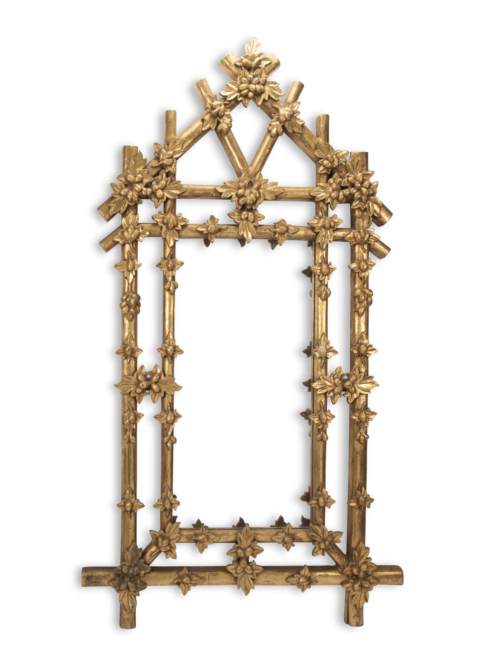 A large carved giltwood mirror: 20th Century The rectangular mirror set in a trellis-shaped wood frame with carved fruit and leaf decoration 88.75" H x 51.25" W x 3.5" D