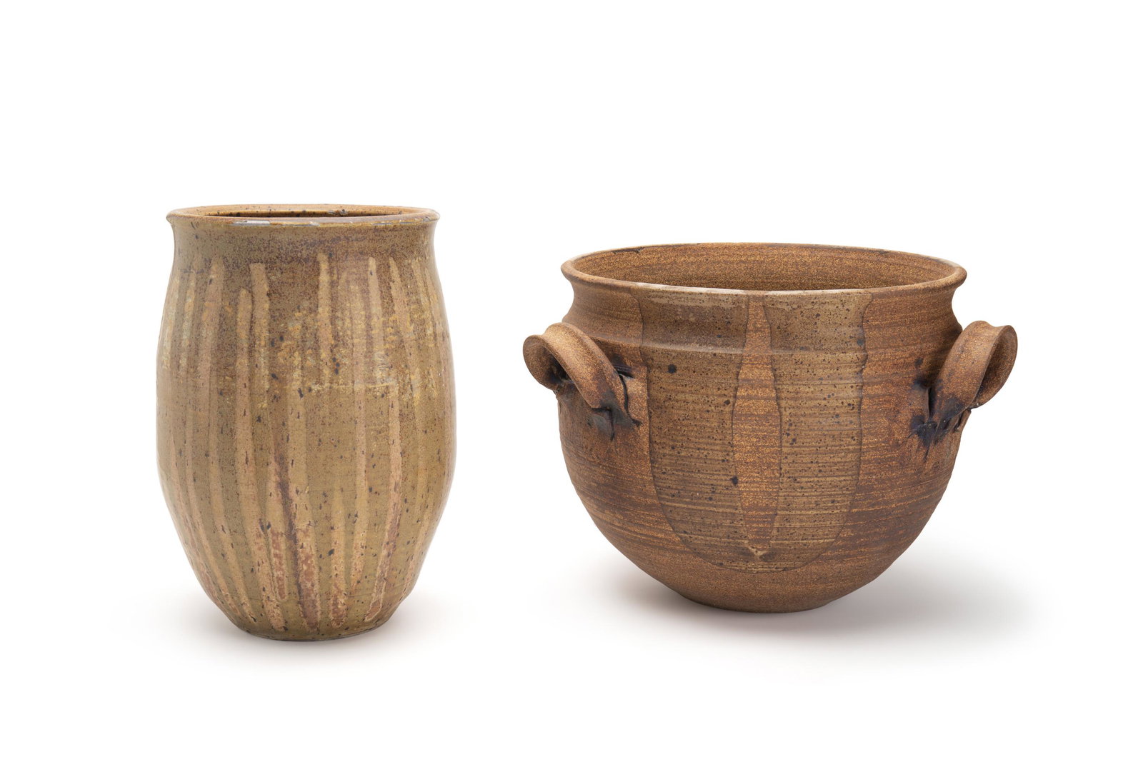 Two earthenware studio pots: 20th/21st Century Larger signed to base: Moss Comprising a three-handled pot with monochrome glazed vertical stripes and a tall pot with earthtone abstract glazed design, 2 pieces Larger: 12" H x 17" 