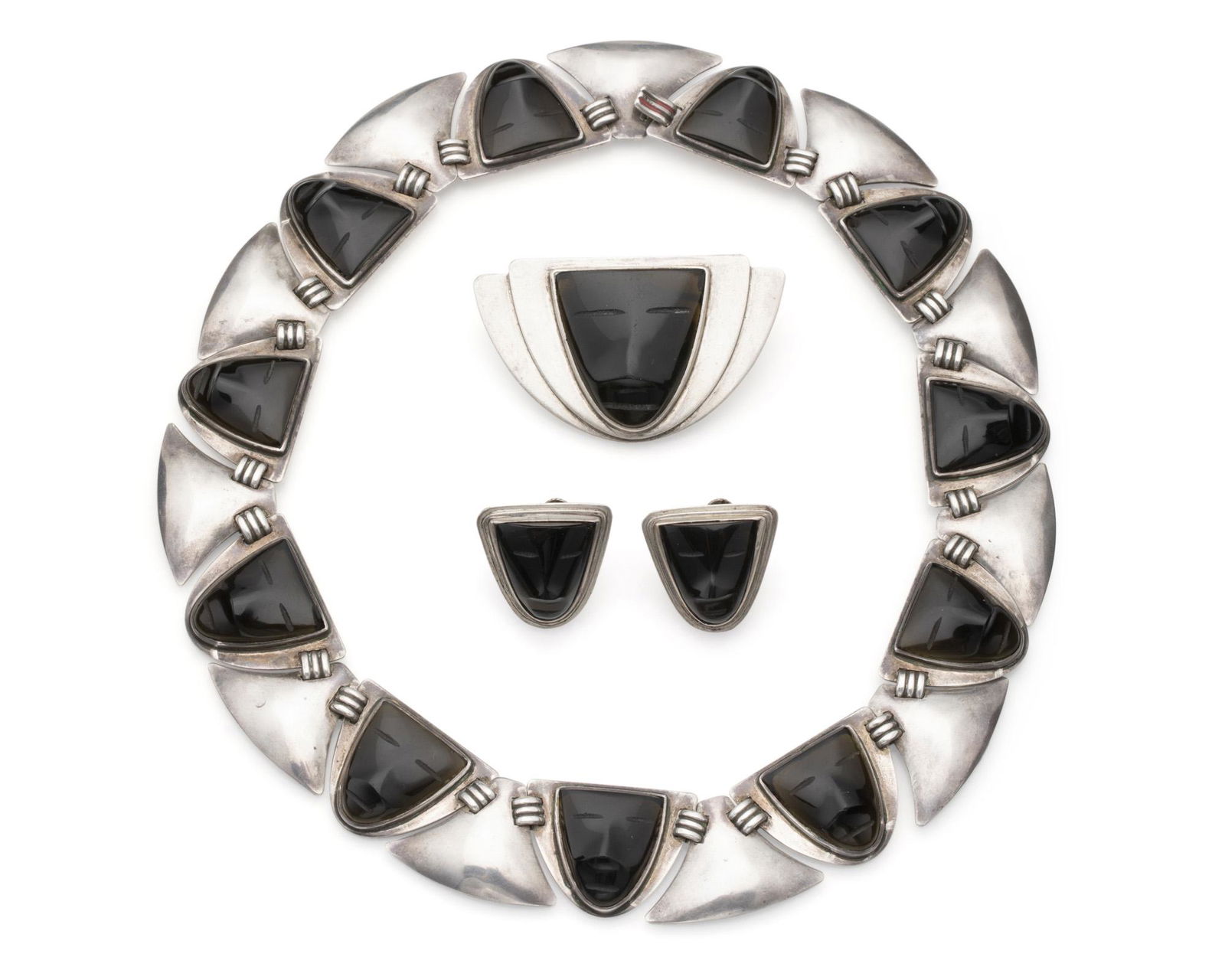 A suite of Fred Davis Mexican silver and obsidian mask (1 of 4)