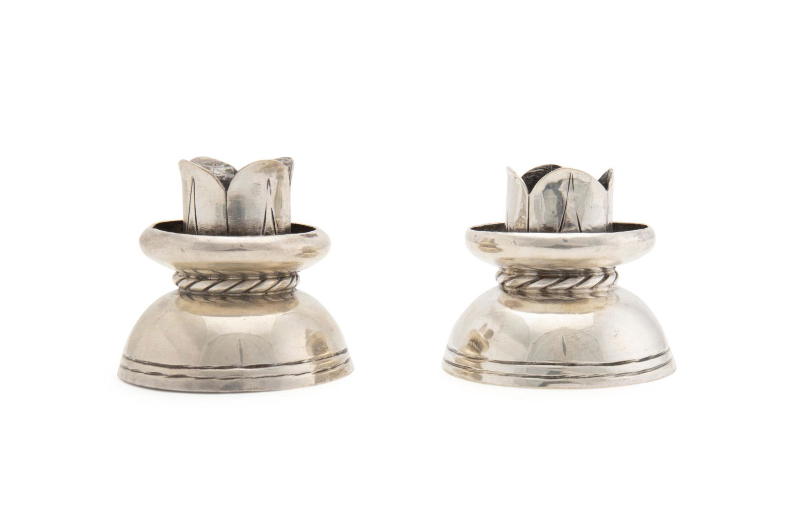 A pair of William Spratling sterling candlesticks (1 of 2)