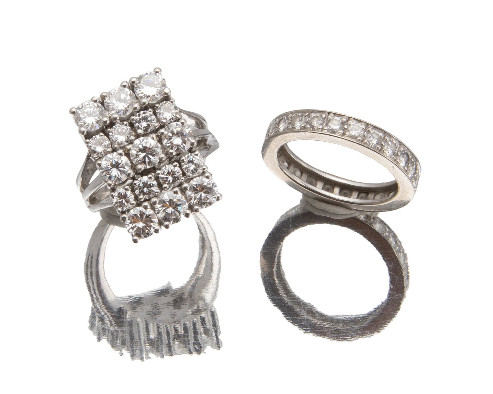 Two diamond rings: 14k white gold Comprising a five row diamond ring and an eternity band, set with a total of forty full-cut round diamonds totaling approximately 3.85 cts. and graded H-K color, VS-SI clarity Each ring