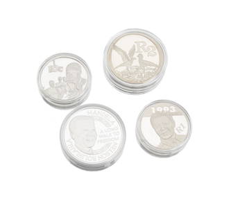Four South African silver coins: Each enclosed in a protective plastic case, comprising a 1993 Nelson Mandela/Frederick Willem de Klerk coin (38.0mm), a 2006 R2 silver coin (39.0mm) a 2007 10C coin (32.0mm), and a 1993 R1 coin (33.0m