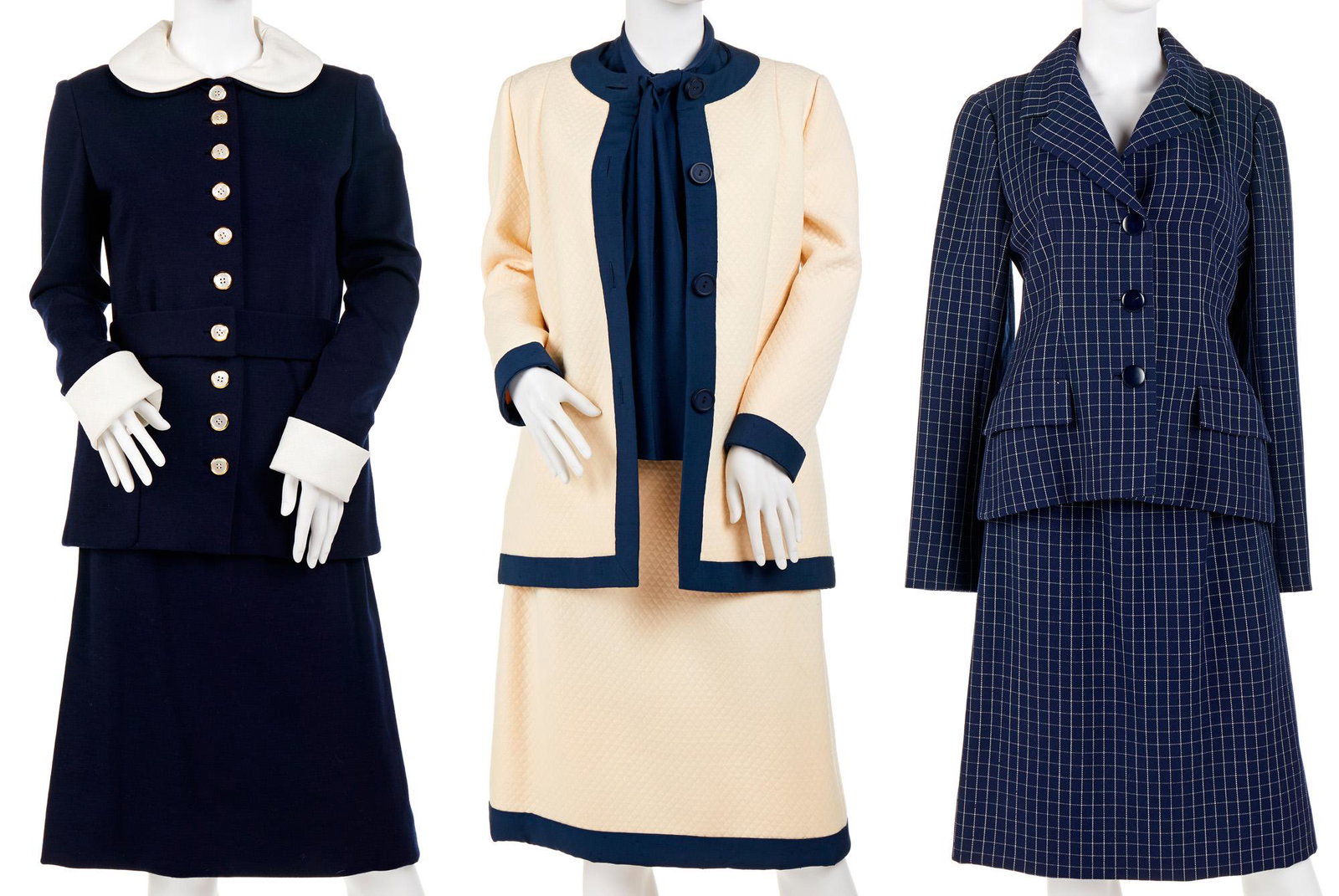 Three Norman Norell skirt suits: Circa 1960s Each with fabric label Comprising a navy suit with detachable white collars and cuffs, a navy suit with cream check stripes, and a cream suit with navy trim and sleeveless blouse, 7 pieces