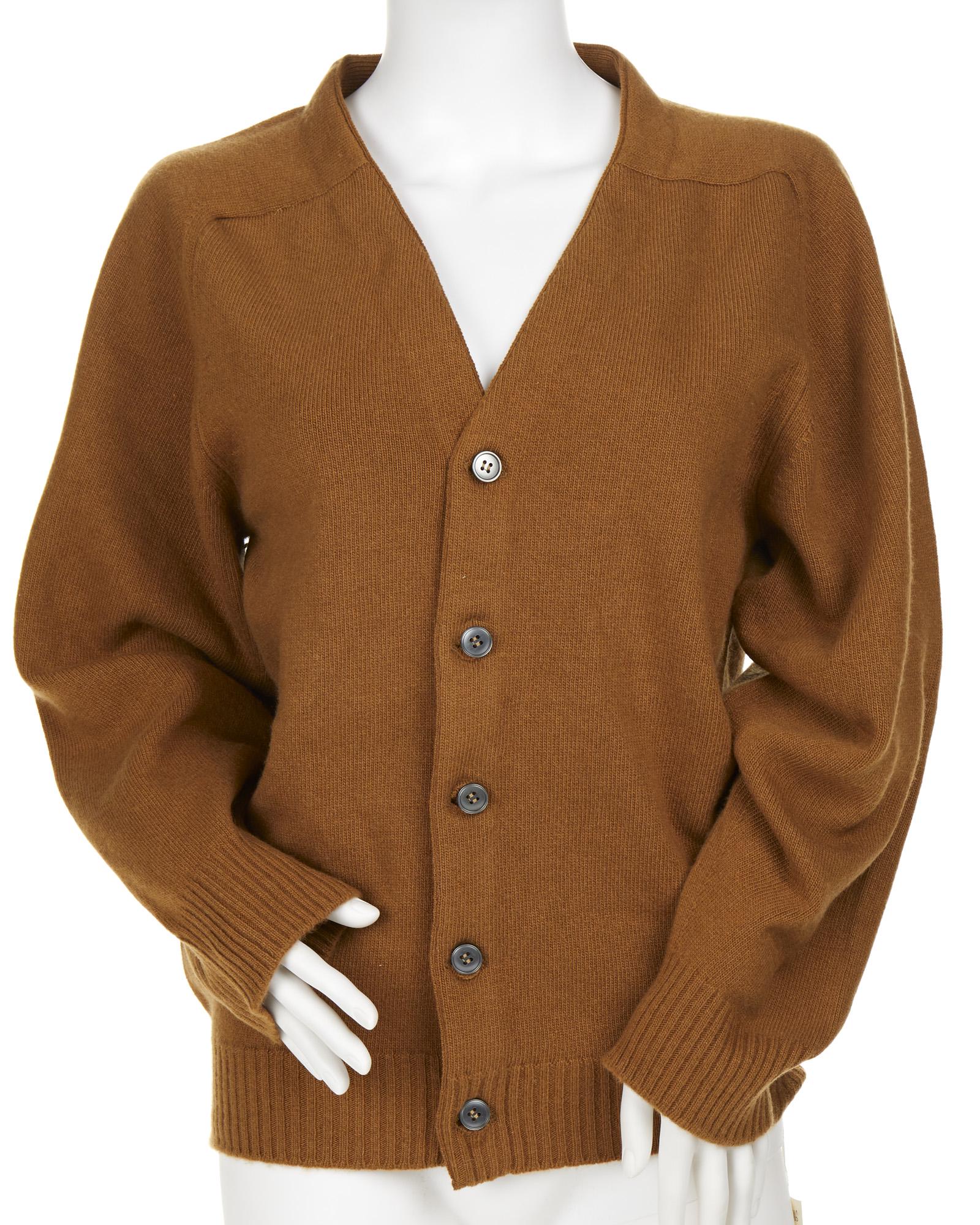 A brown Hermes cardigan: Fourth quarter 20th century Fabric label: Hermes Paris / Exclusif / 100% Cashmere; Original paper label attached Size 50