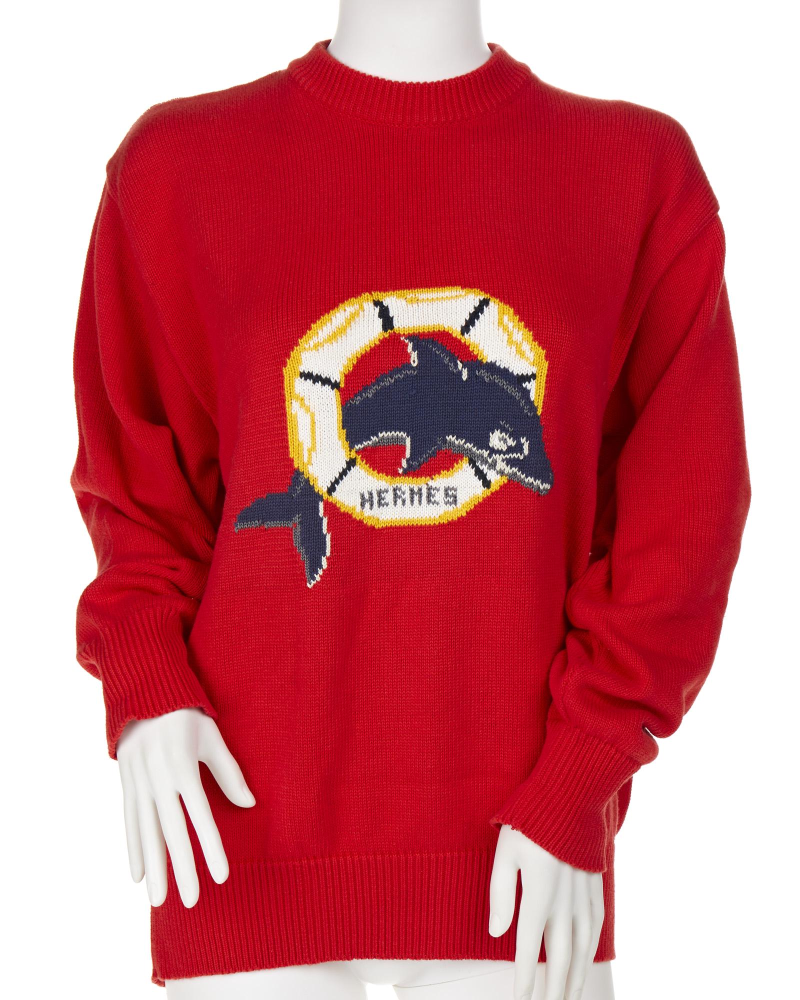 An Hermes dolphin-motif sweater: Fourth quarter 20th century Fabric label: Hermes Paris / Made in Italy / 100% Cotton Size 50