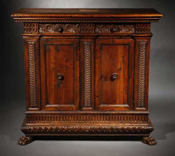 An Italian baroque walnut credenza