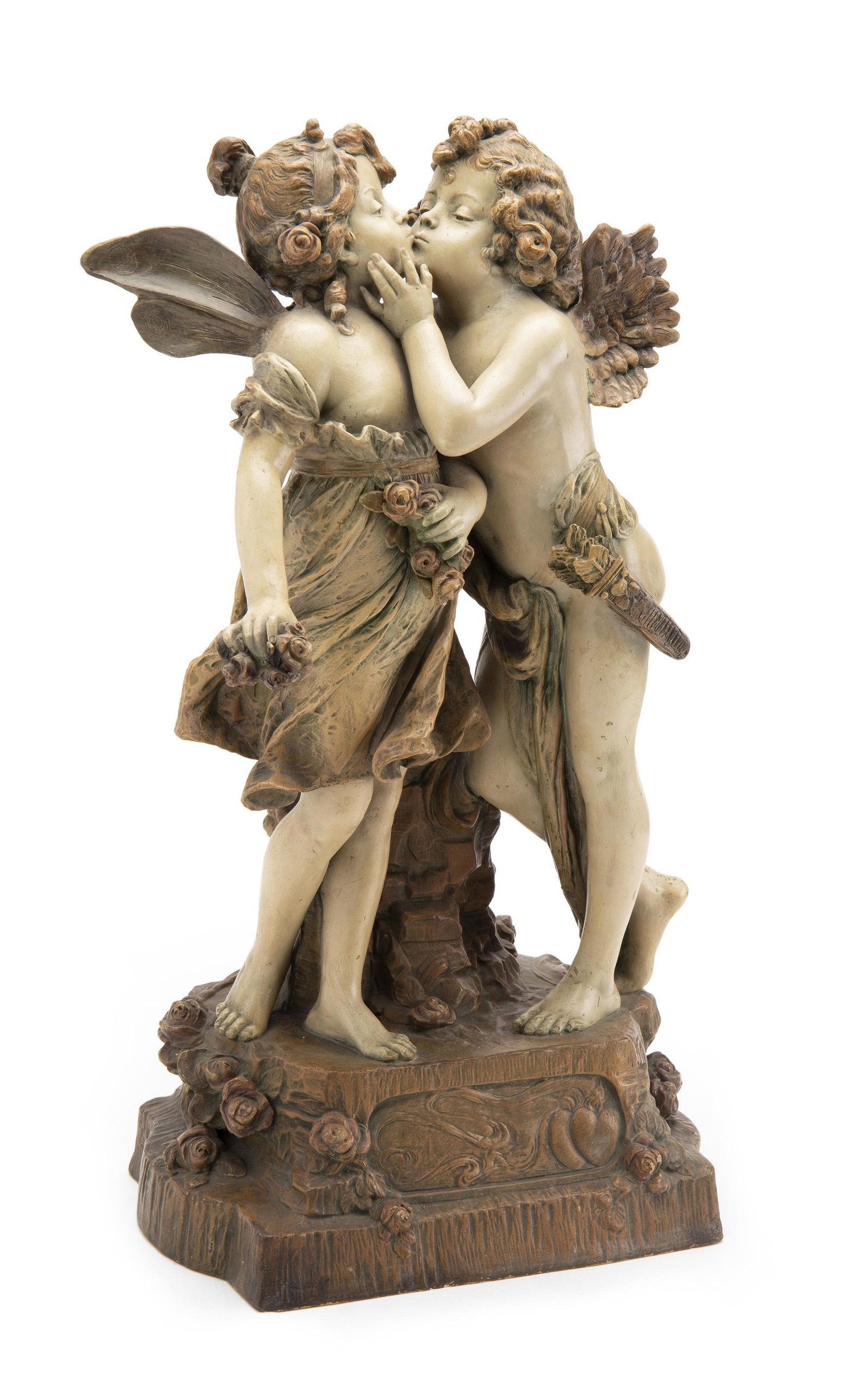 A tall Amphora figural sculpture: Fourth-quarter 19th Century Apparently unmarked Depicting a winged putto and fairy in embrace 22" H x 11.5" W x 7.375" D
