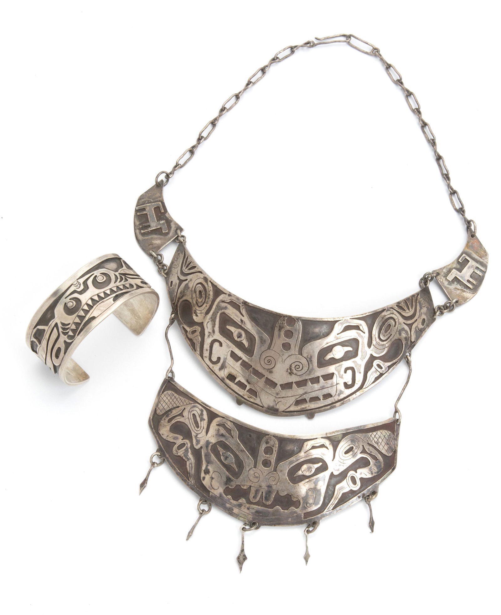 Two Northwest Coast silver overlay jewelry items (1 of 3)