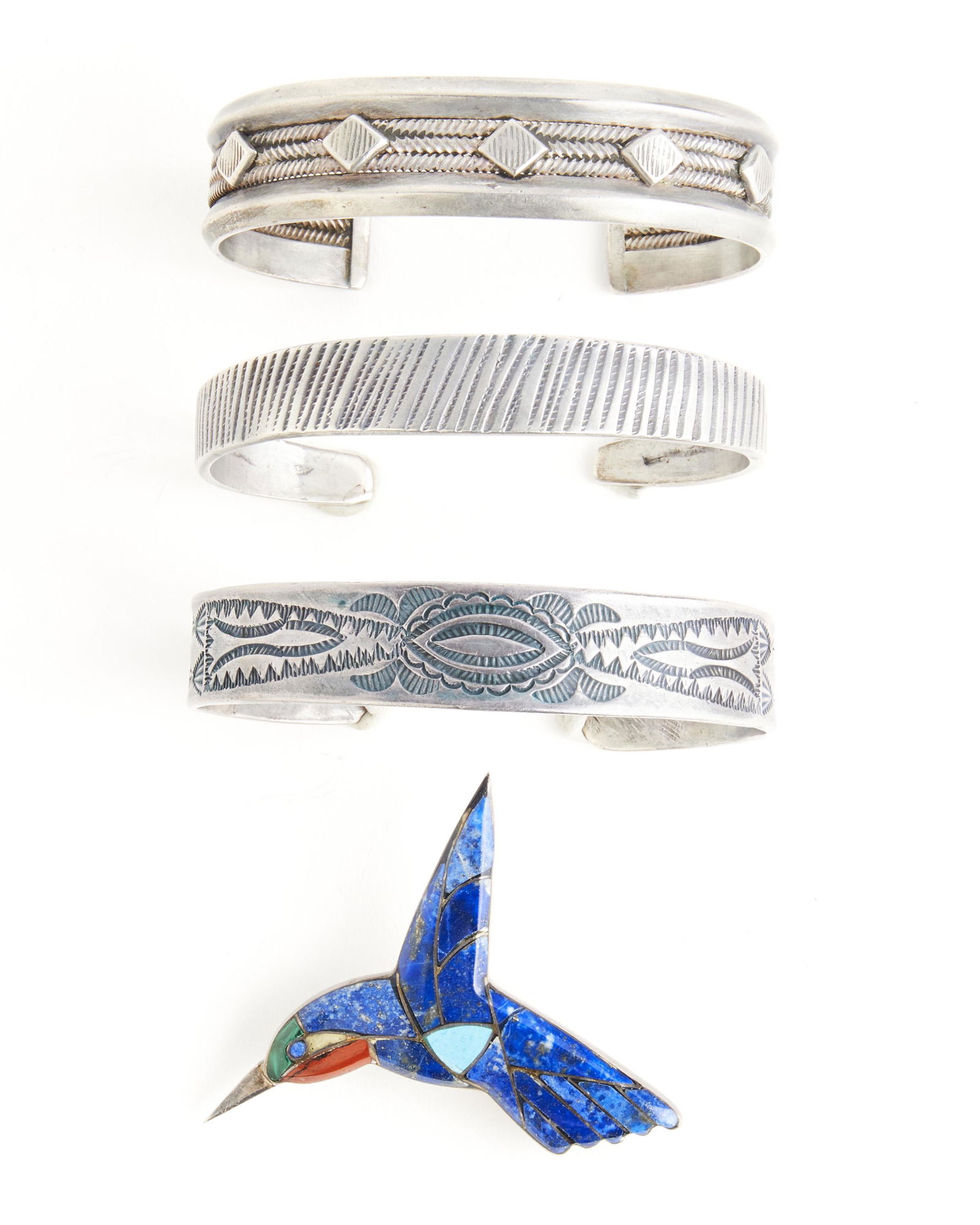 A group of silver jewelry (1 of 2)