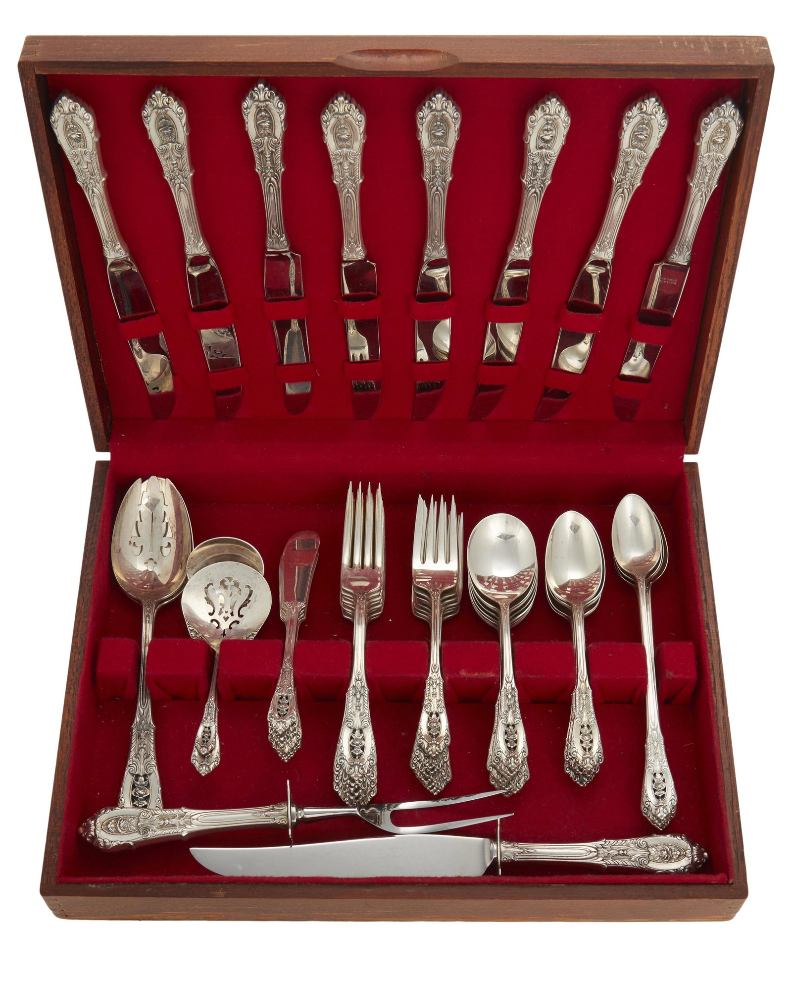 A Wallace "Rose Point" sterling silver flatware service: Second-half 20th Century Each stamped: Wallace / Sterling Designed 1934 by William S. Warren, comprising 8 hollow-handled knives (9"), 8 flat-handled butter spreaders (5.5"), 8 forks (7"), 8 salad for
