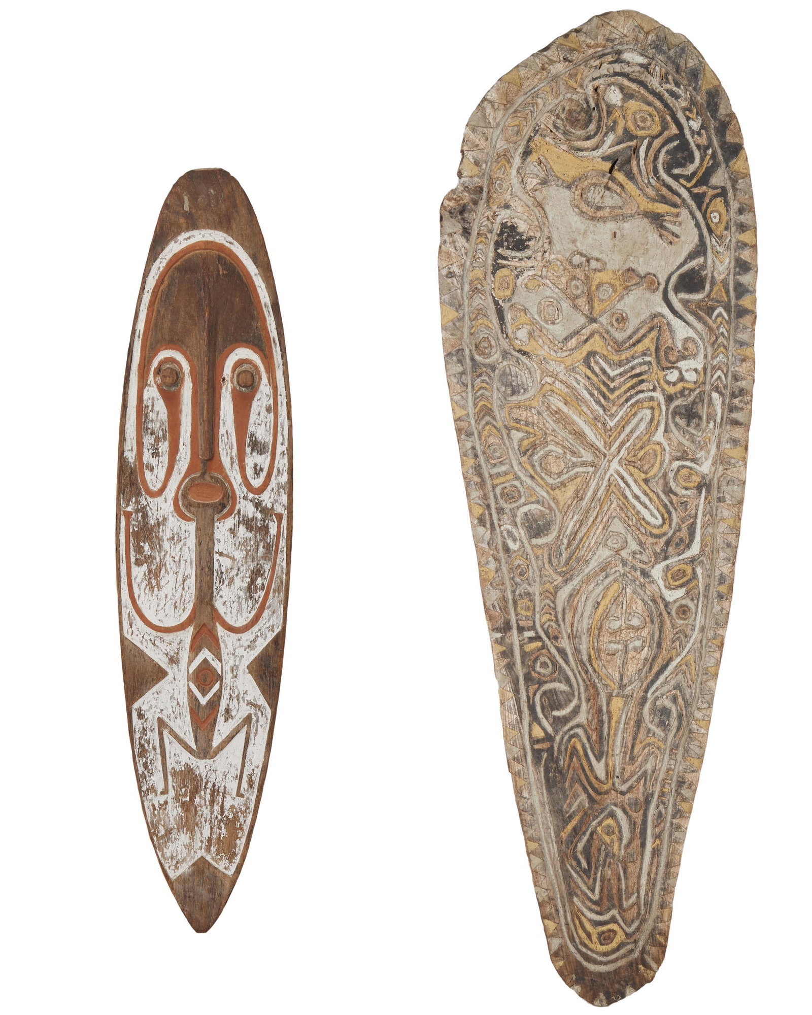 Two Oceanic ceremonial items: 20th Century, Papua New Guinea Comprising a ceremonial battle shield from the upper Sepik River and a Gope spirit board from the Gulf of Papua, 2 pieces Larger: 69" H x 23" W x 1.5" D Provenance: Both
