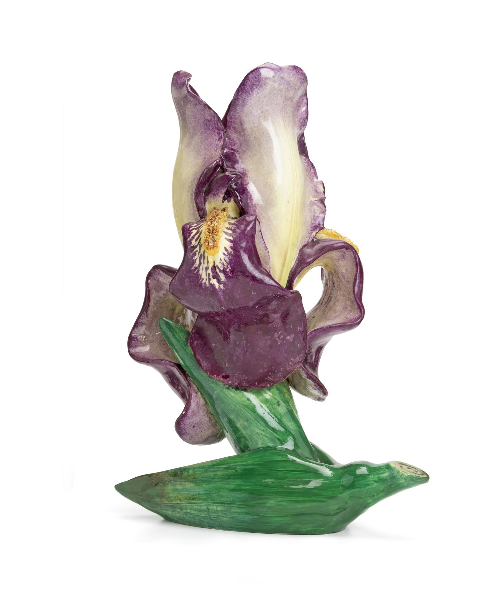 A Delphin Massier Paris glazed ceramic table vase: Late-19th/early-20th Century Signed to base Delphin Massier VSVS Iris The tall purple and green bearded iris shaped vase with three petal-shaped handles 17" H x 12" W x 8" D