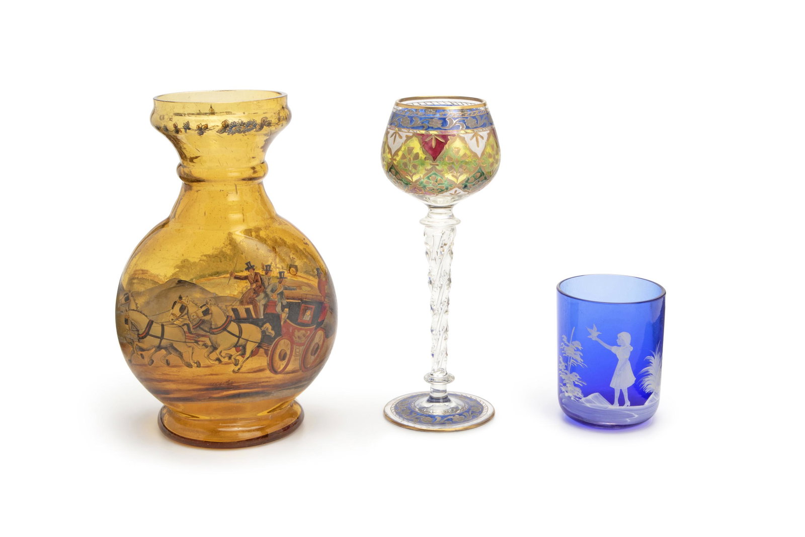 Three glass table articles: Early-20th Century Comprising a painted Bohemian goblet, a yellow glass vase with a painted body centering a scene of a horse-drawn carriage and drivers, and a cobalt blue glass cup with a scene of a 