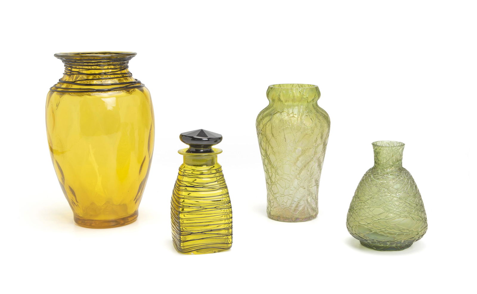 A group of art glass pieces: First-half 20th century Comprising a yellow glass vase with dimpled surface and threaded shoulder, a yellow glass perfume bottle with threaded exterior and stopper, possibly Steuben, an iridescent gr