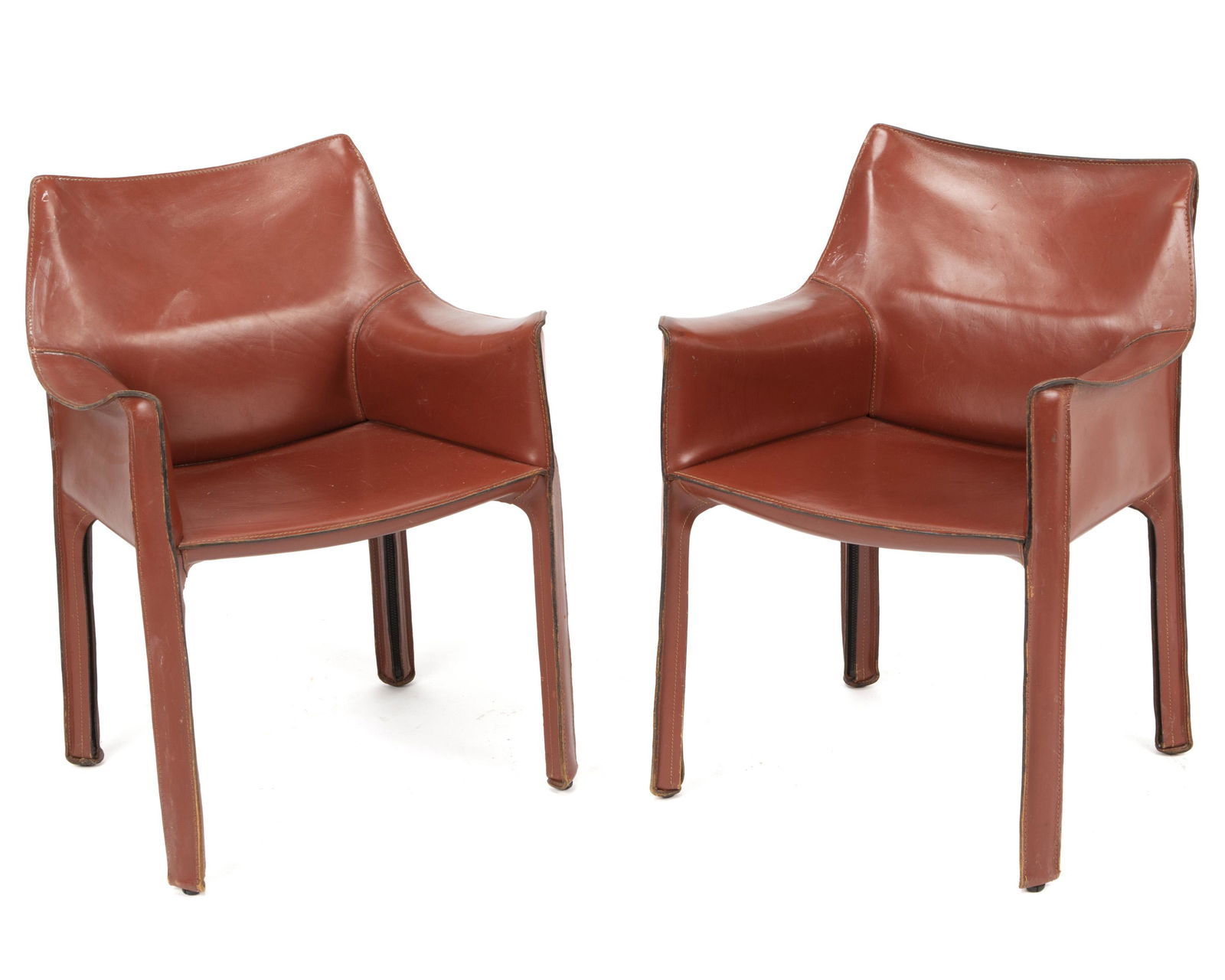 Mario Bellini (b. 1935, Italian): "413 Cab" armchairs, 2 pieces Leather with steel frame Designed for Cassina Each approximately: 30.5" H x 20.5" W x 20" D