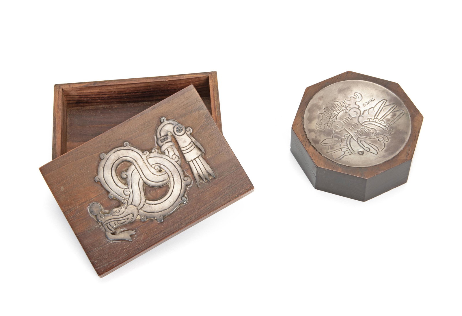 Two William Spratling .980 silver table items: 1933-1938; First Design Period; Taxco, Mexico Each stamped for William Spratling; Further stamped: 980; Box branded: Taxco Comprising a box with an applied sterling serpent and one dish with eagle mot