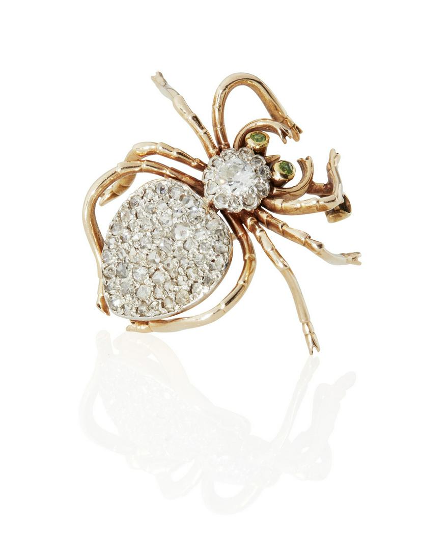 An Antique diamond and demantoid garnet spider brooch (1 of 3)