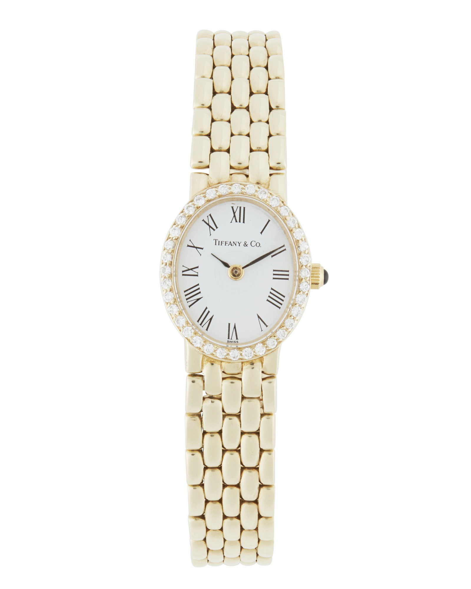 A Tiffany & Co. diamond wristwatch: 14k yellow gold Dial: Oval white porcelain dial, black Roman numeral hour markers, signed: Tiffany & Co. Movement: Quartz 6 jewel ETA movement Case: 14k yellow gold case, integrated link bracelet, sta