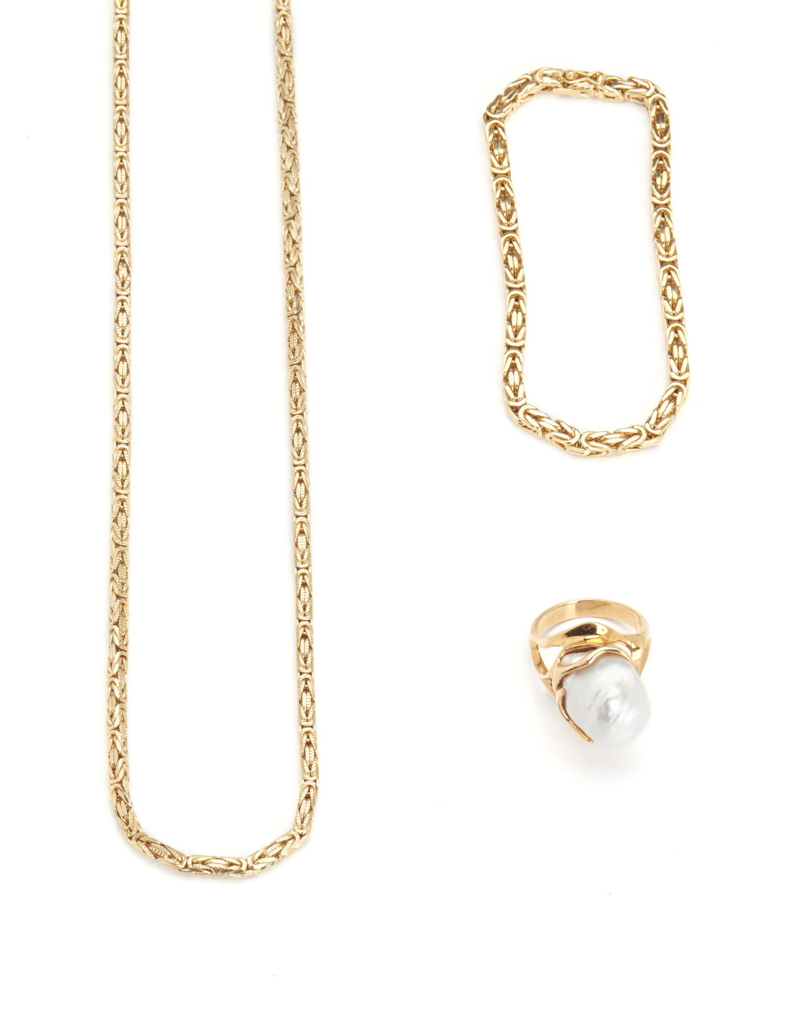 A group of gold jewelry (1 of 1)