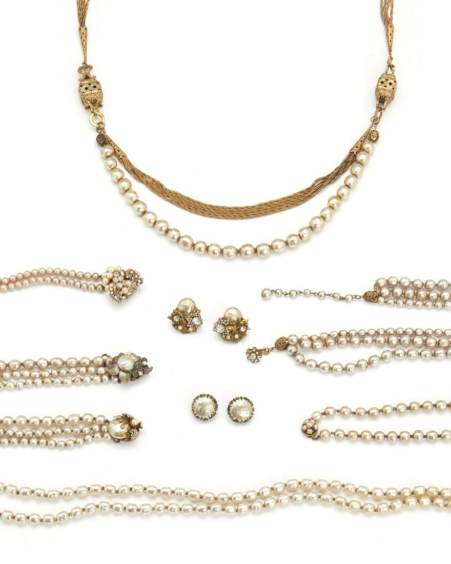 A group of Miriam Haskell jewelry: Circa 1940s Each signed: Miriam Haskell Comprising three single-strand of faux-pearls, two double-strands of faux-pearls, a pair of faux-pearl ear clips, a pair of faux-pearl and rhinestone ear clip