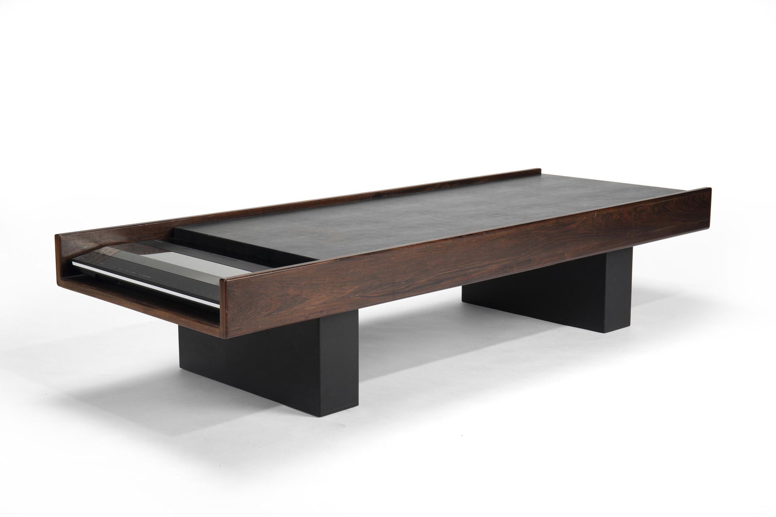 John Scott (Late 20th/early 21st Century, American): Custom designed low table in dark walnut and textured black vinyl with Bang & Olufsen Beomaster 4500 stereo system Walnut and laminate 15.25" H x 72" W x 27" D