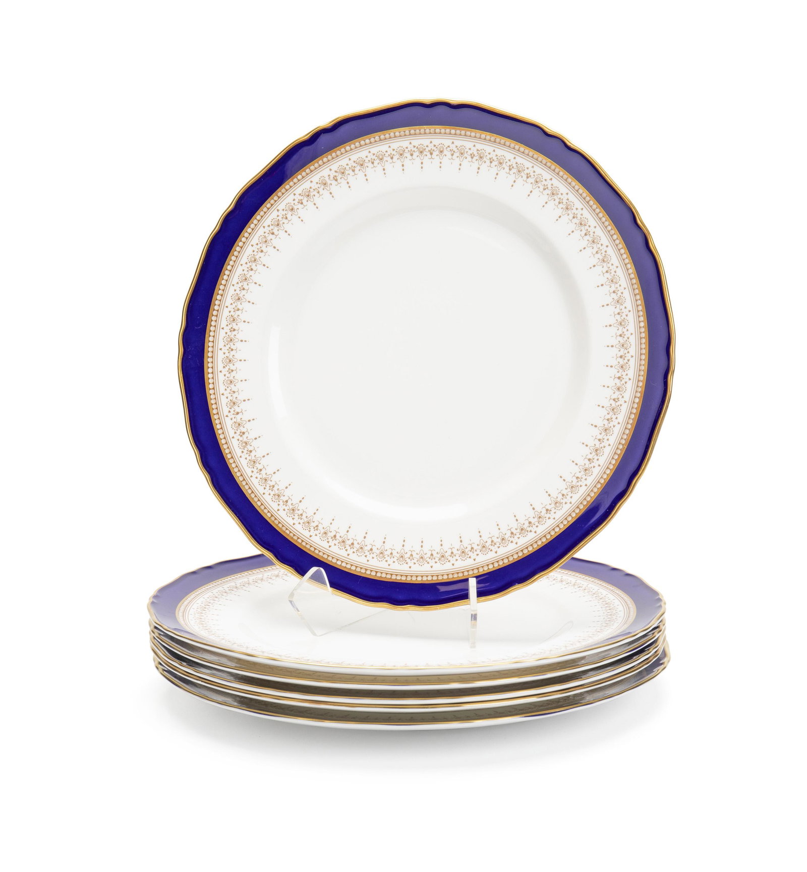 Six Royal Worcester "Regency" china dinner plates: Fourth-quarter 20th Century Each marked: Royal Worcester Fine Bone China / R / England / Regency Each with cobalt banded edges with gilt details, 6 pieces .875" H x 10.875" Dia.
