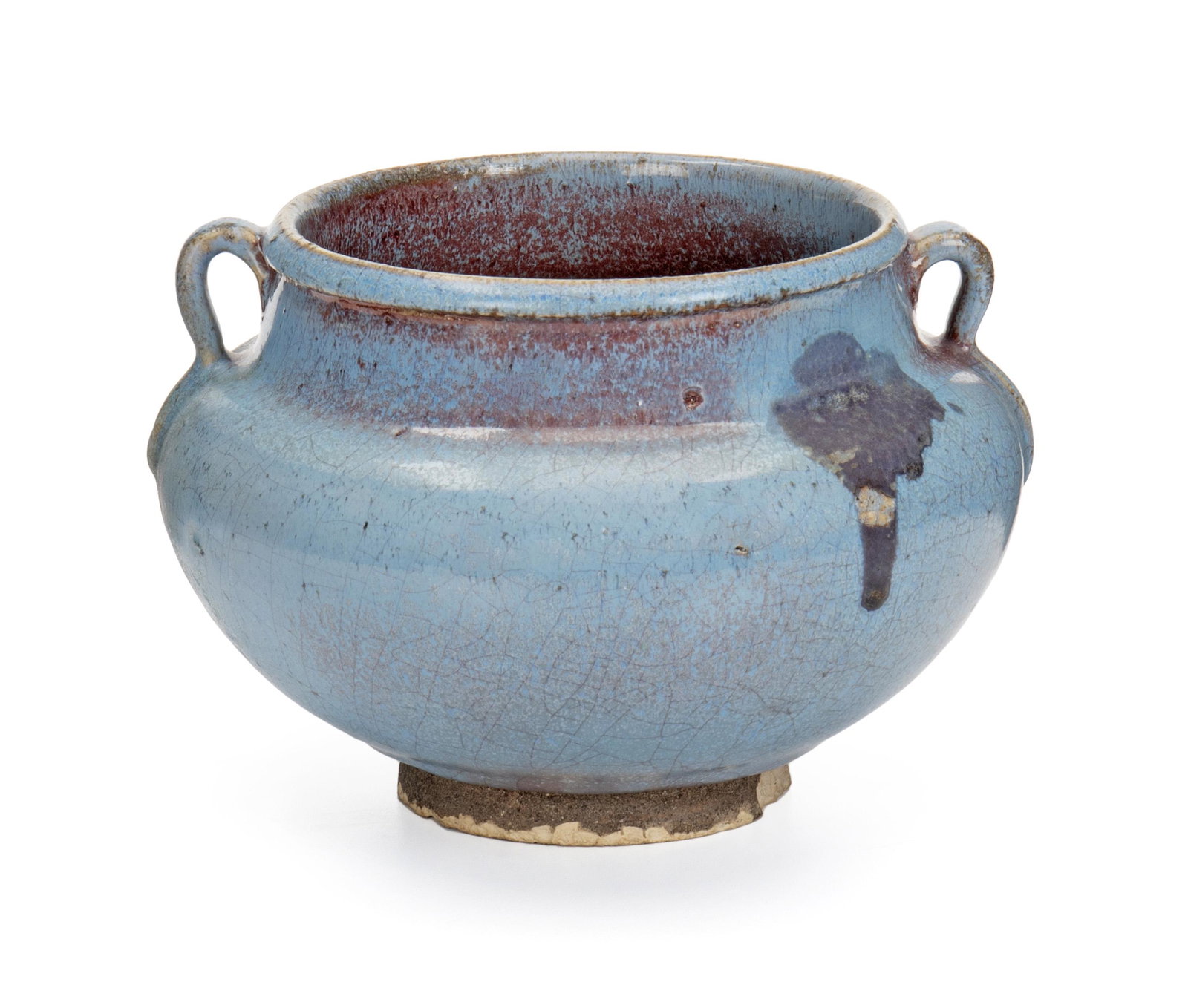 A Chinese two-handled glazed earthenware bowl: Late Qing Period (19th Century) The wide-rimmed bowl with a fluted neck flanked by two loop handles with a thick light blue and midnight blue glaze 4.5" H x 6.5" Dia.