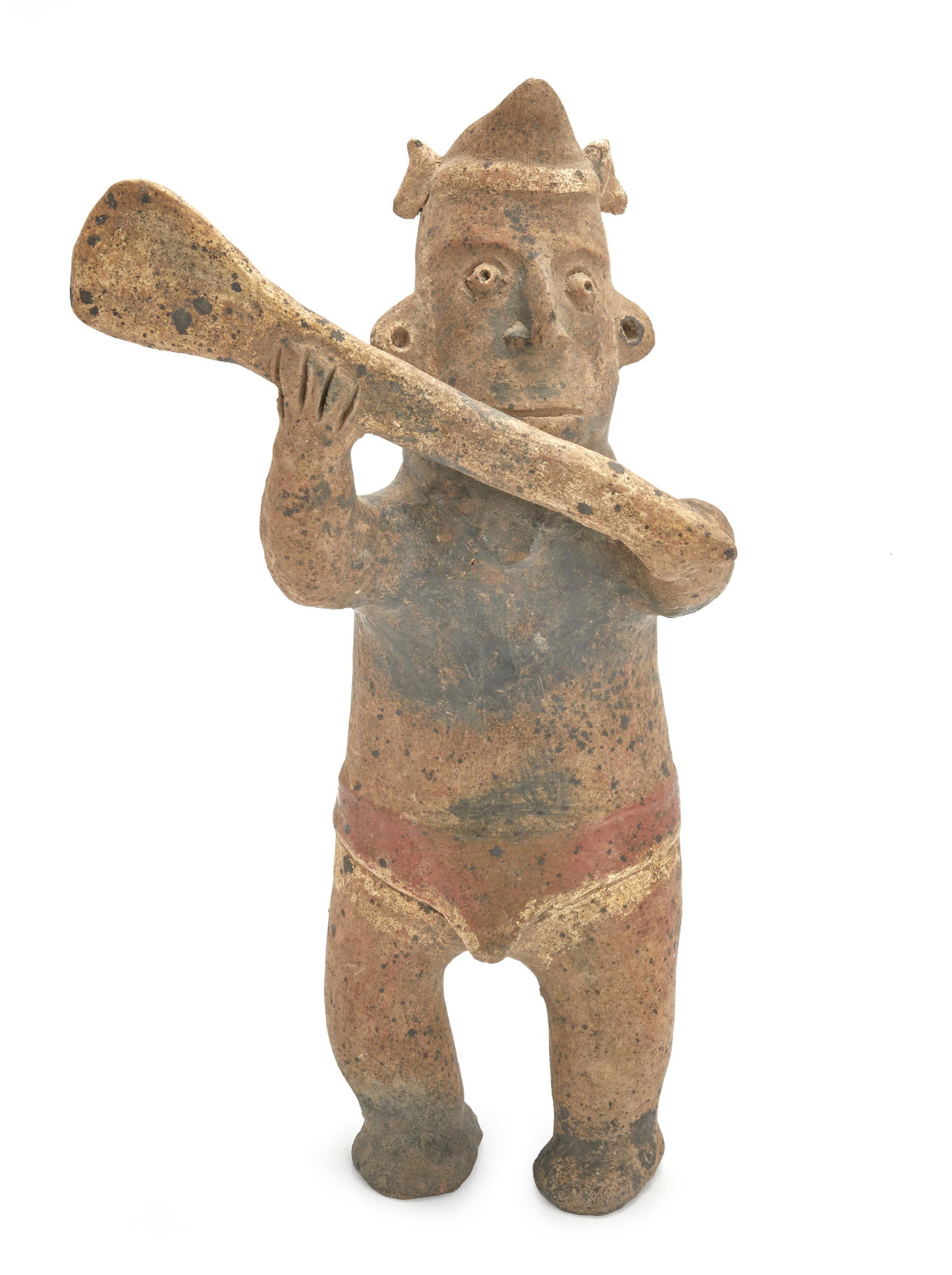 A Pre-Columbian Colima figure: Circa 150 BCE-250 CE The earthenware standing warrior figure with raised club and headdress 19" H x 10.25" W x 6" D Provenance: Bonhams, San Francisco, Native American and Pre-Columbian Art, 06/04/07,