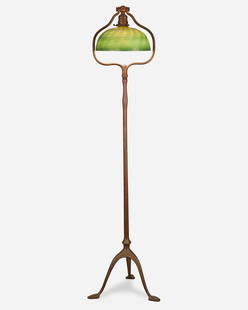 A Tiffany Studios harp floor lamp: Circa 1902-1919; New York, NY Shade signed: L.C.T. / Favrile; Base signed: Tiffany Studios / New York / 423 The green and gold iridescent damascene Favrile glass shade with tones of blue and