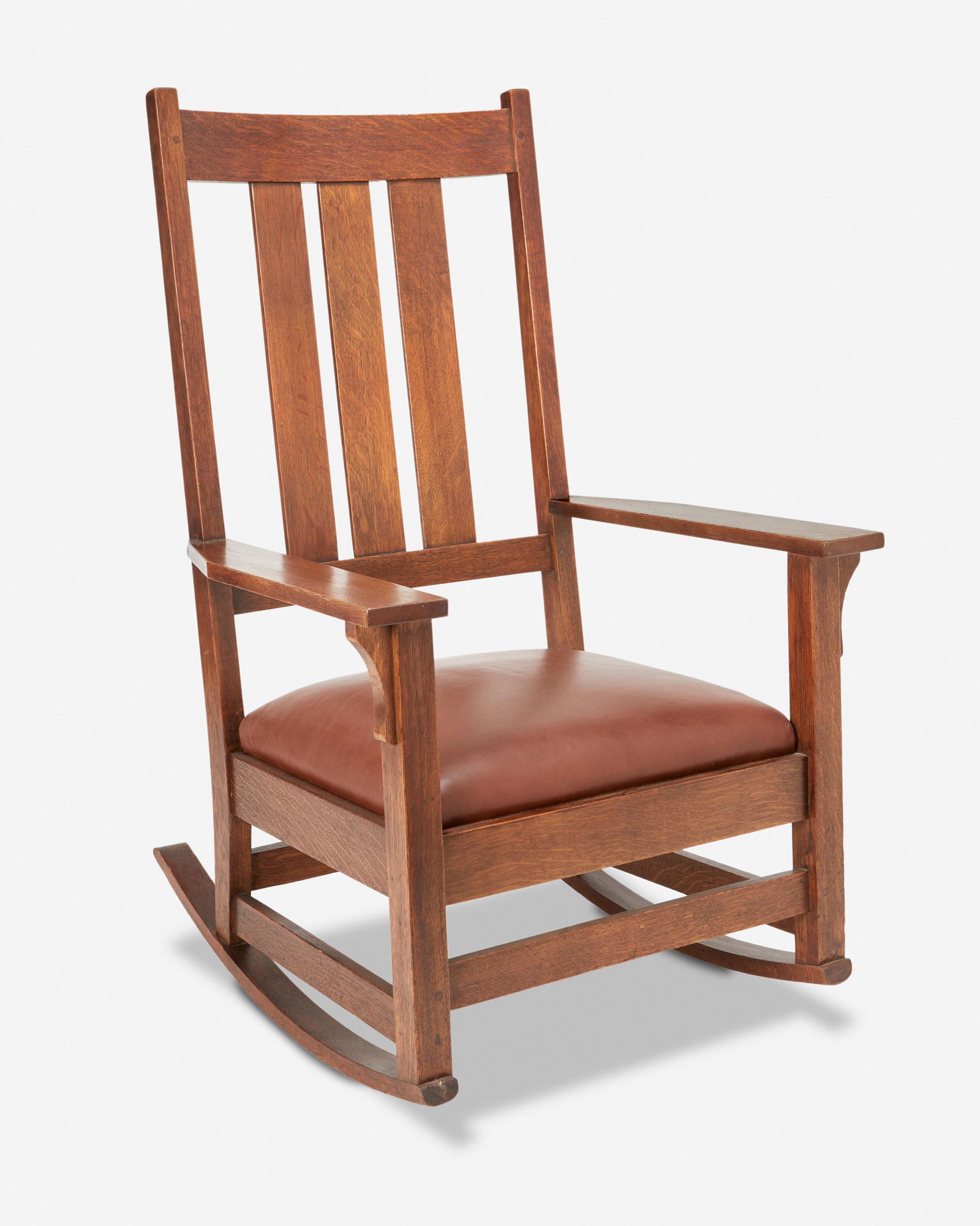 A Gustav Stickley oak rocking chair, No. 397 (1 of 5)